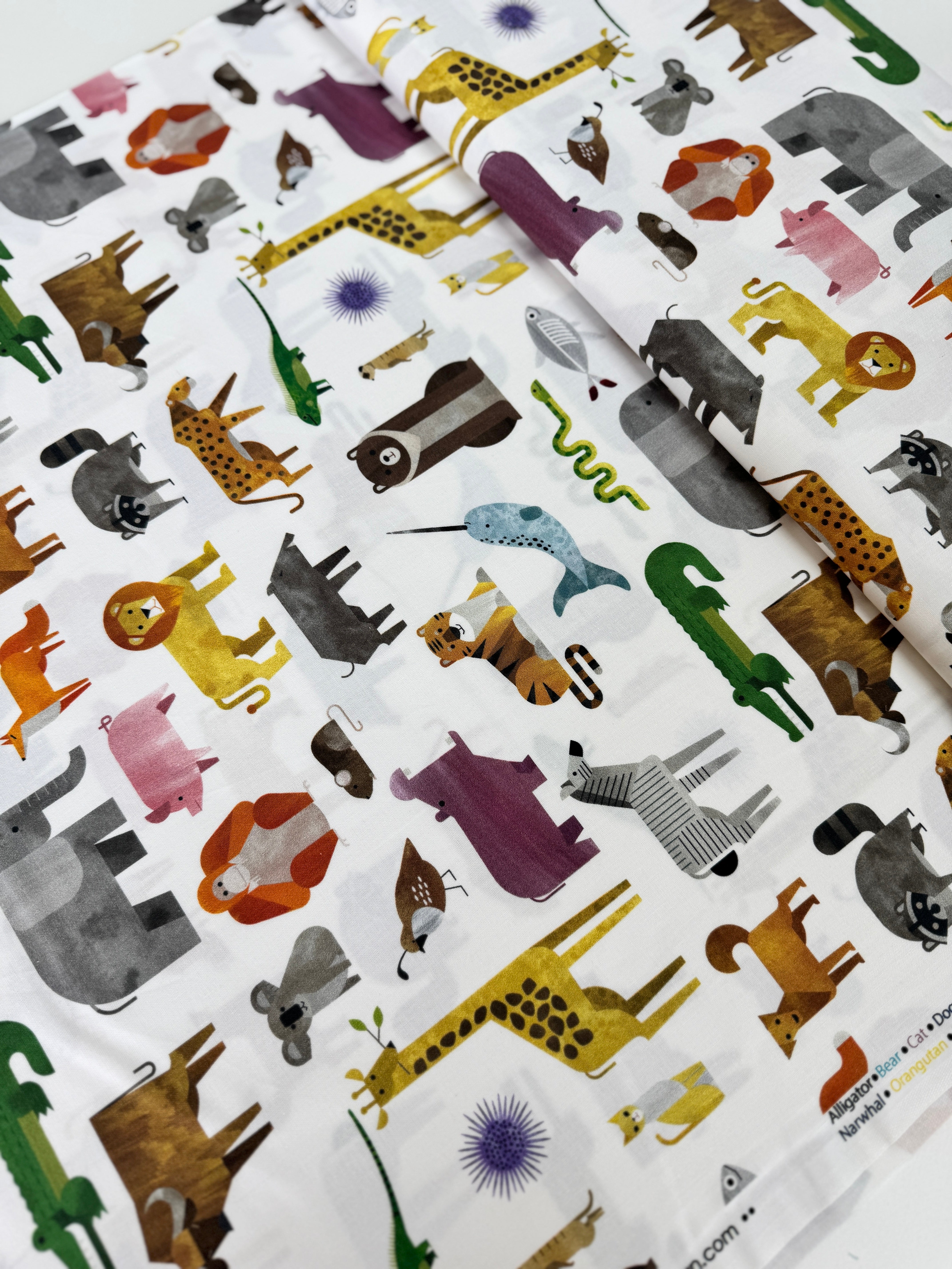 A to Z Animals fabric by Robert Kaufman – alphabet and animals print on 100% cotton for kids and nursery projects.