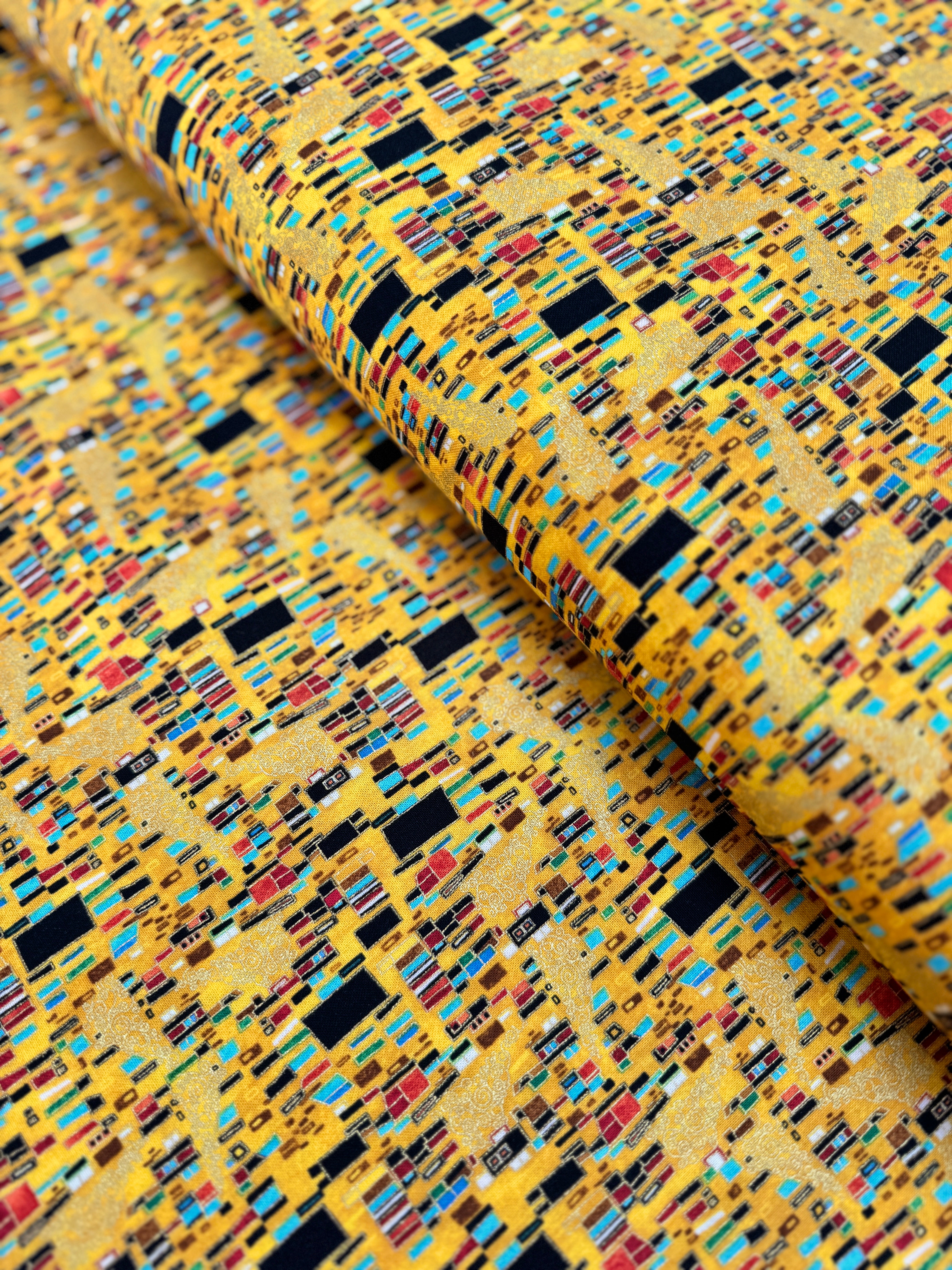 Cleo Bejeweled Golden Geo Abstract Square fabric – metallic cotton by Chong-a Hwang for Timeless Treasures with jewel tones and gold accents.