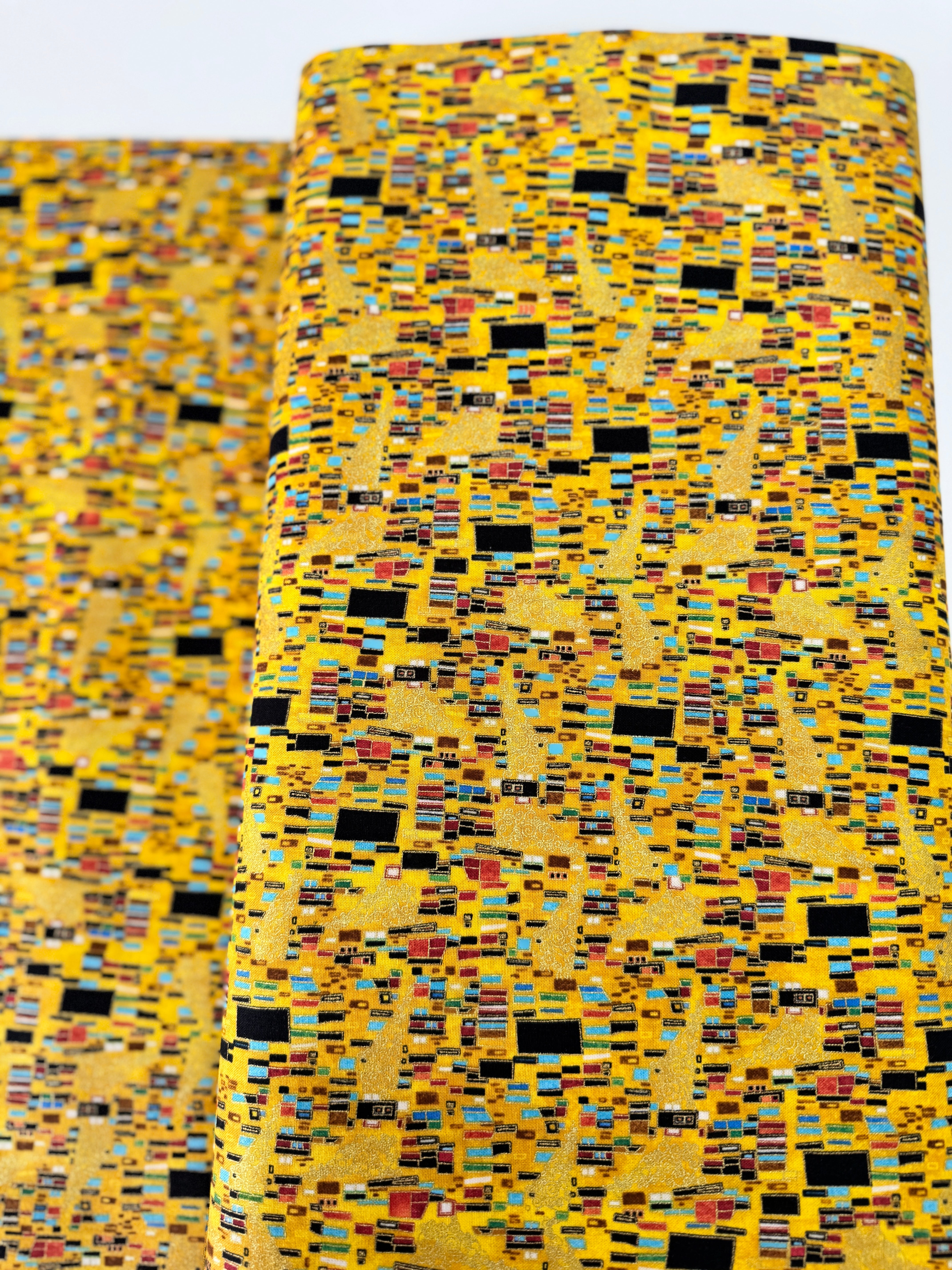 Cleo Bejeweled Golden Geo Abstract Square fabric – metallic cotton by Chong-a Hwang for Timeless Treasures with jewel tones and gold accents.