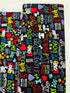 I Love My Dog Black fabric by Gail Cadden for Timeless Treasures – colorful dog-themed words on black cotton.