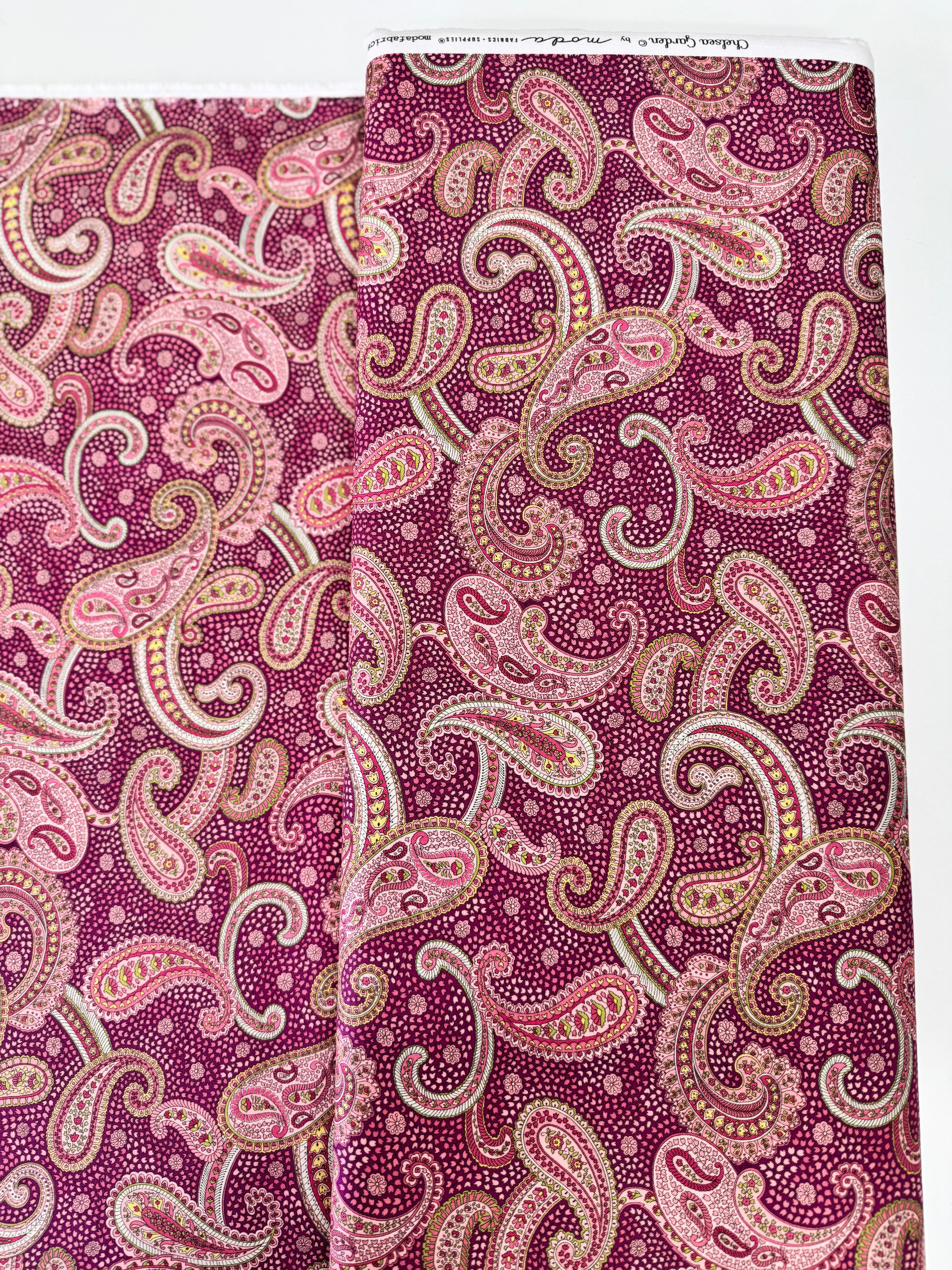 Chelsea Garden Bohemian Flare Paisley Mulberry fabric by Moda – rich paisley floral cotton on mulberry background.