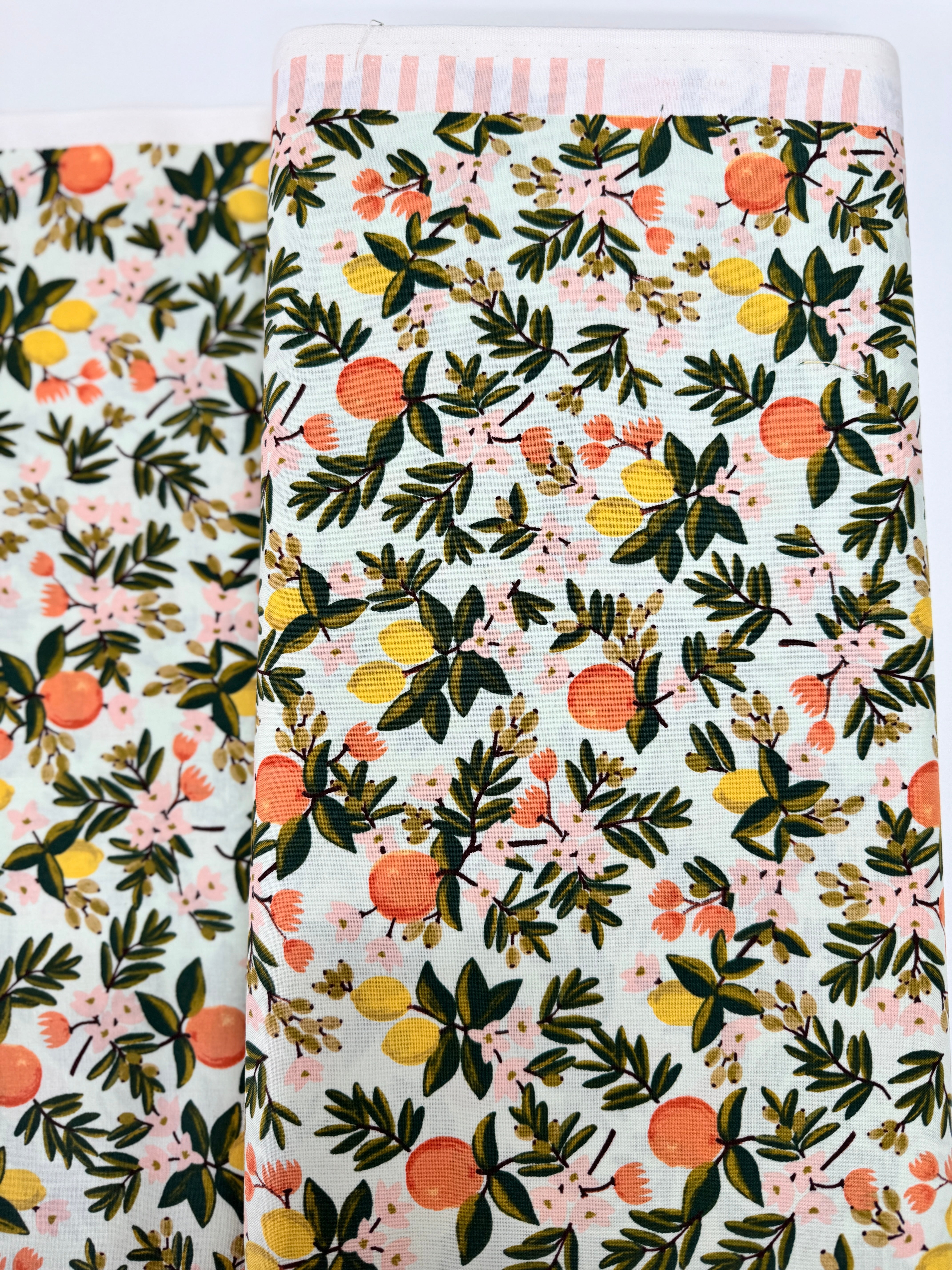 Primavera Citrus Floral Mint fabric by Rifle Paper Co. – 100% cotton with lemons, oranges, and florals on a mint background.