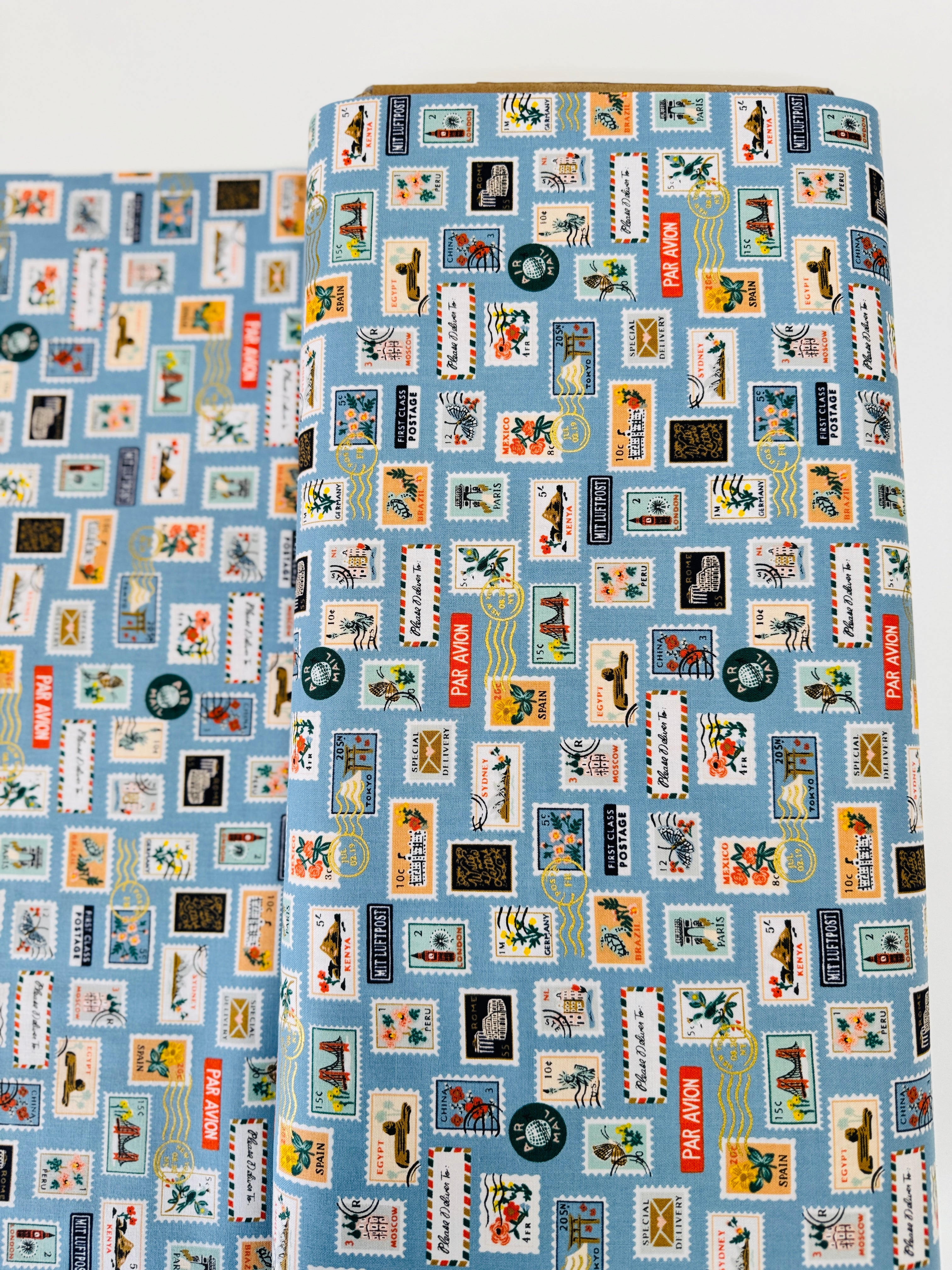 Bon Voyage Postage Stamps Blue Metallic Fabric by Rifle Paper Co.