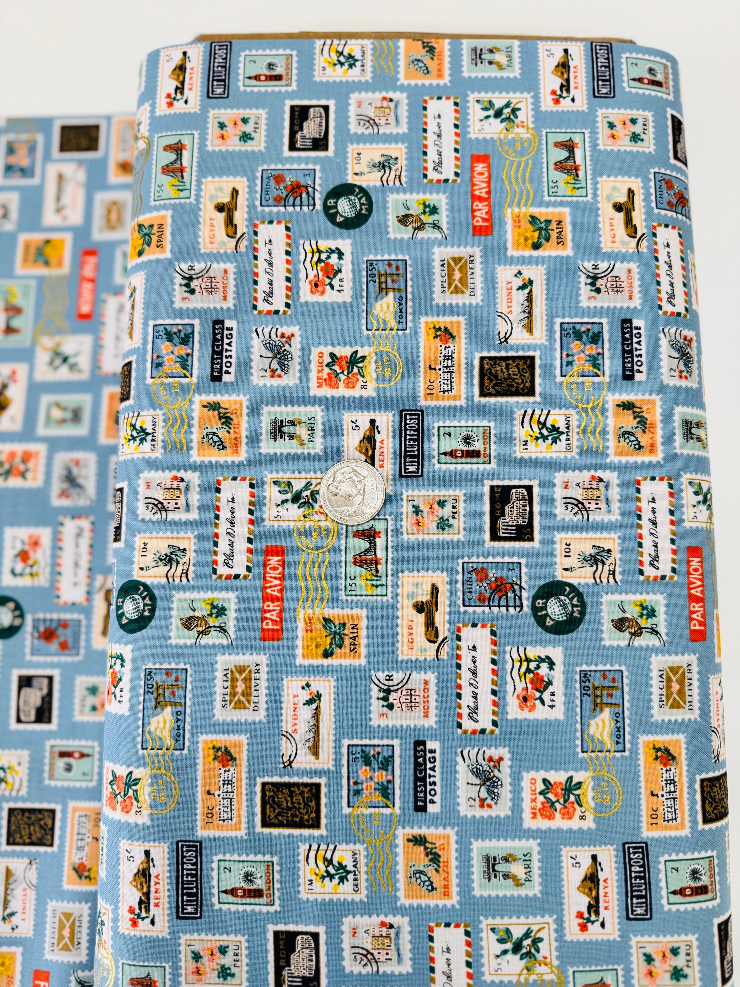 Bon Voyage Postage Stamps Blue Metallic Fabric by Rifle Paper Co.