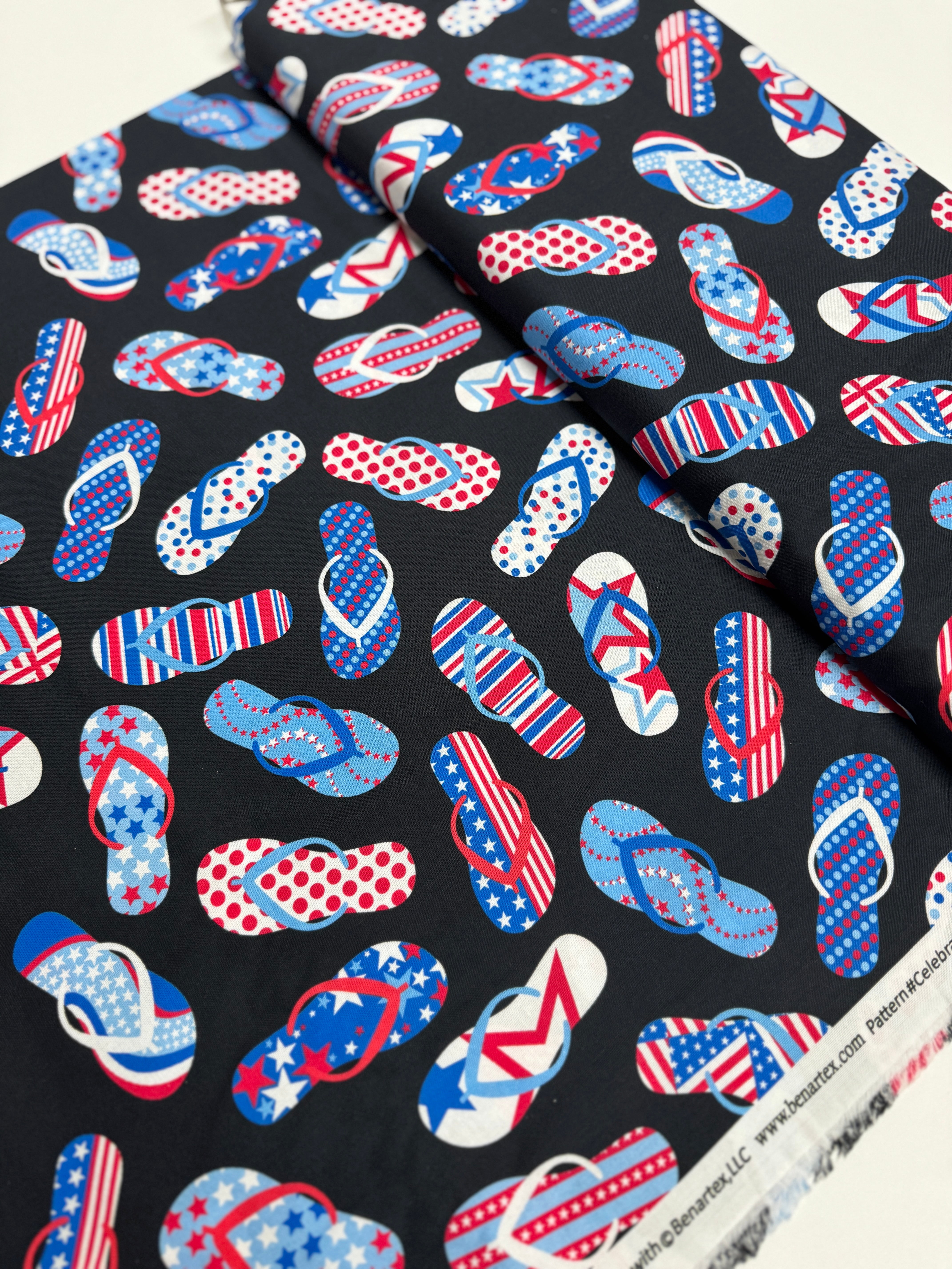 Red White & True Flip Flops on Black Fabric by Kanvas Studio – Patriotic summer cotton