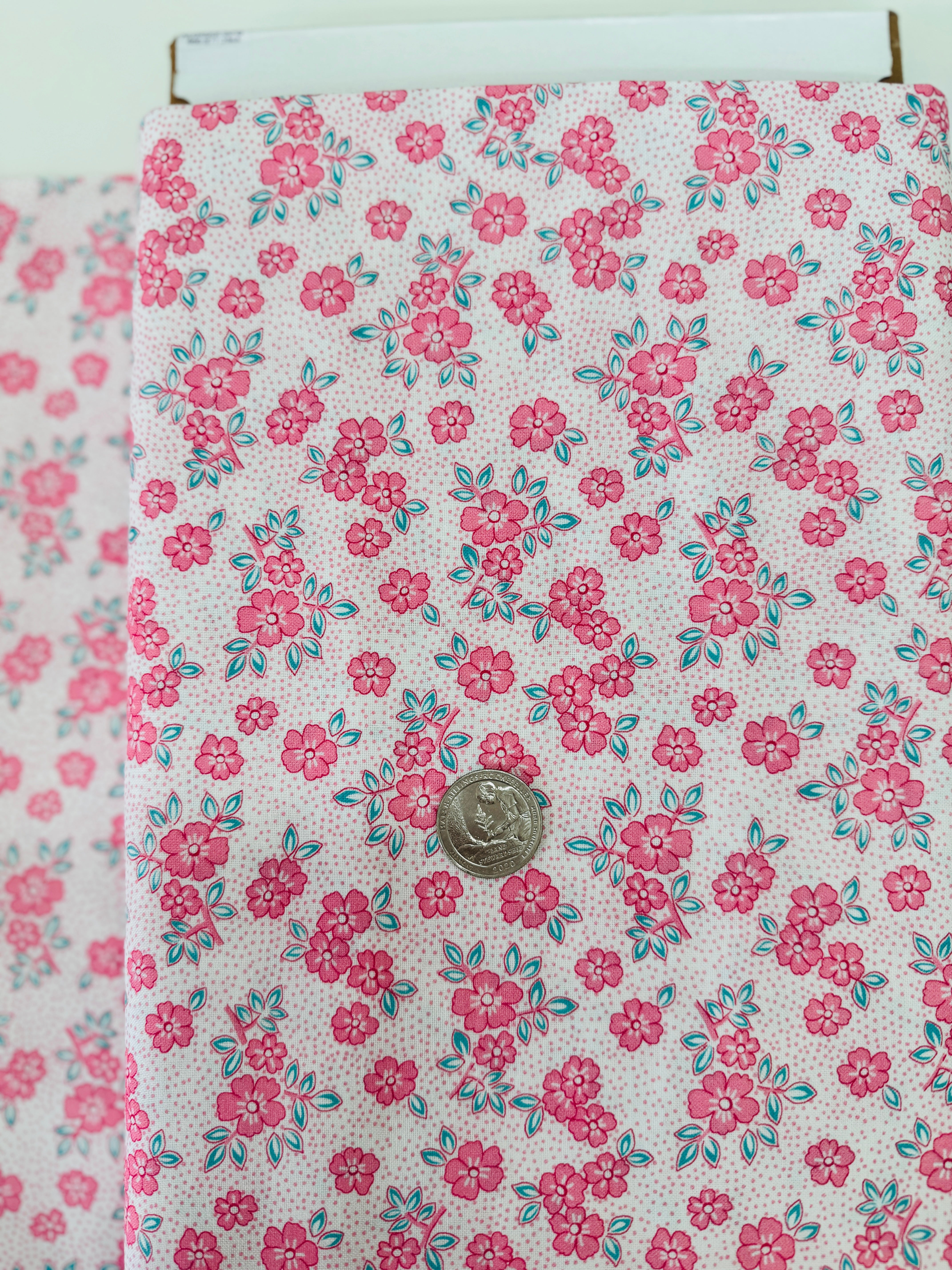 At The Cottage Florals Dots Camellia quilting cotton by Robert Kaufman featuring camellia blossoms and dot accents.