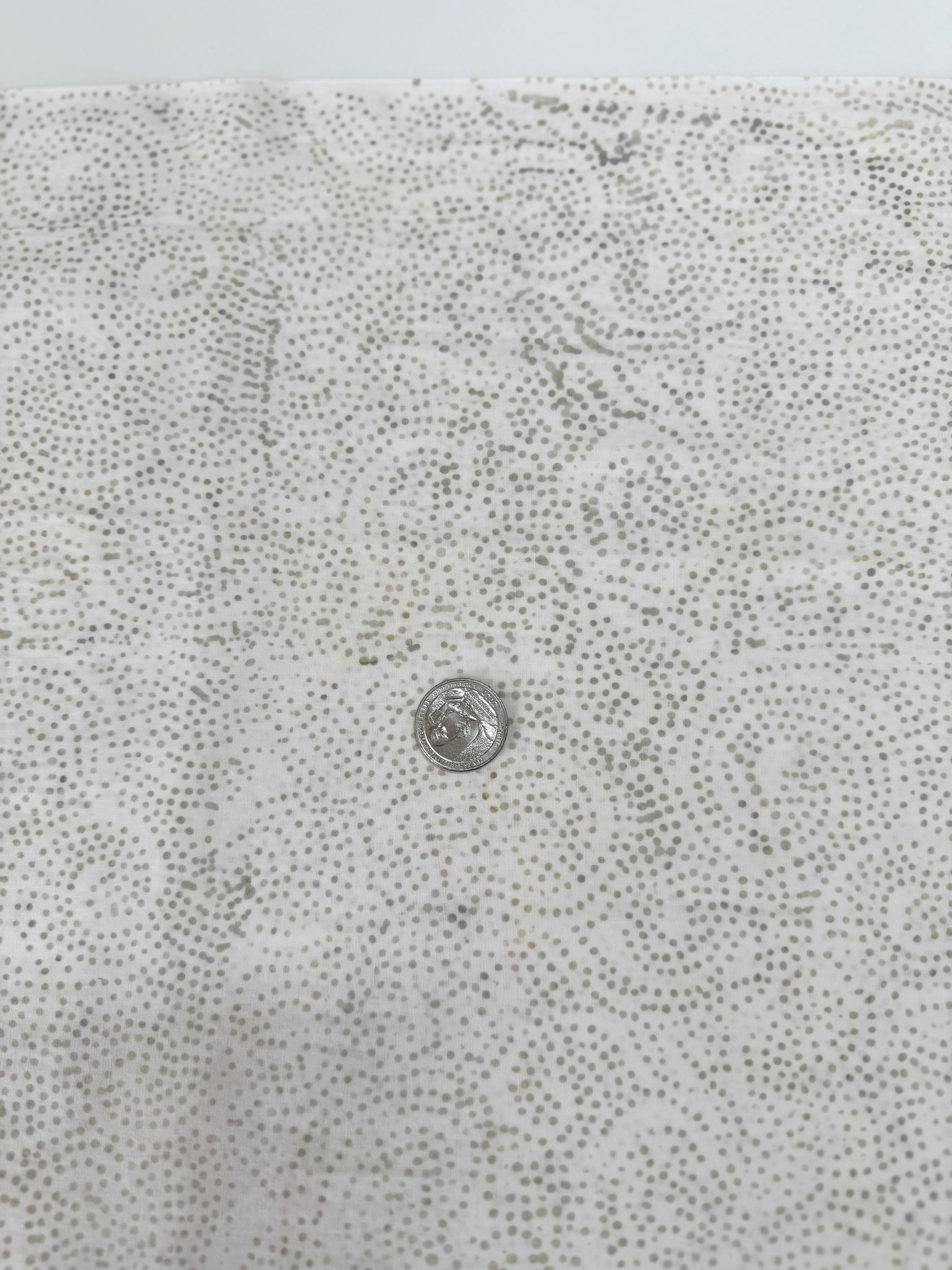 Tonga Stormy Sea Cosmic Sky Bone hand‑dyed cotton batik fabric by Wing and a Prayer for Timeless Treasures in neutral ombre tones.