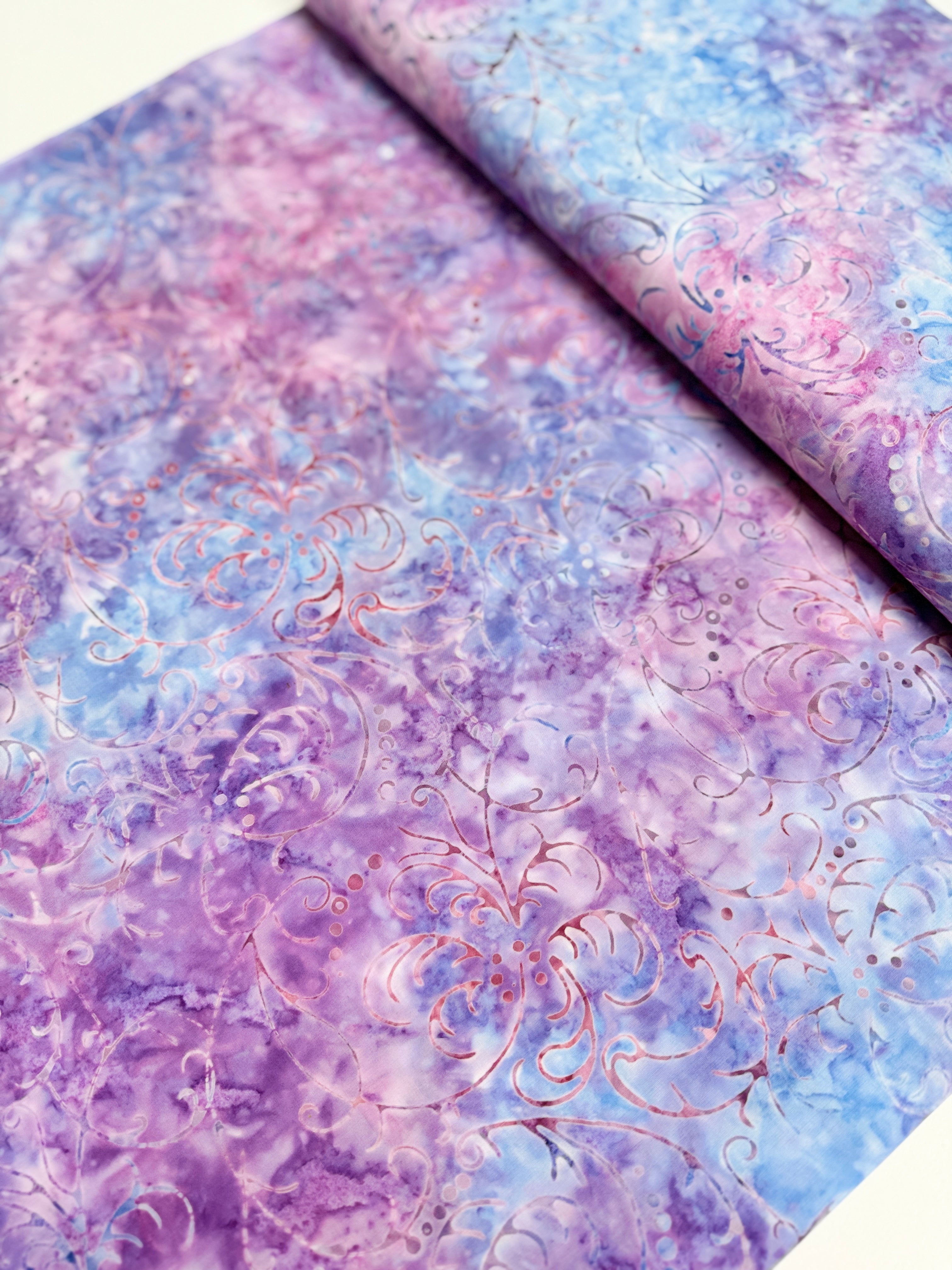 Best of Malam Batiks Feather Blue Mauve Fabric by Jinny Beyer – Hand-dyed cotton batik from RJR Fabrics
