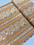 Delhi - Border Golden fabric by Jinny Beyer for RJR Fabrics with ornate Indian-style border design in rich golden tones on 100% cotton.