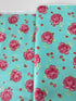 Sugar Bloom Icing Rose Aqua quilting cotton by Verna Mosquera for Free Spirit Fabrics – pink rose design on aqua background, 43″ wide