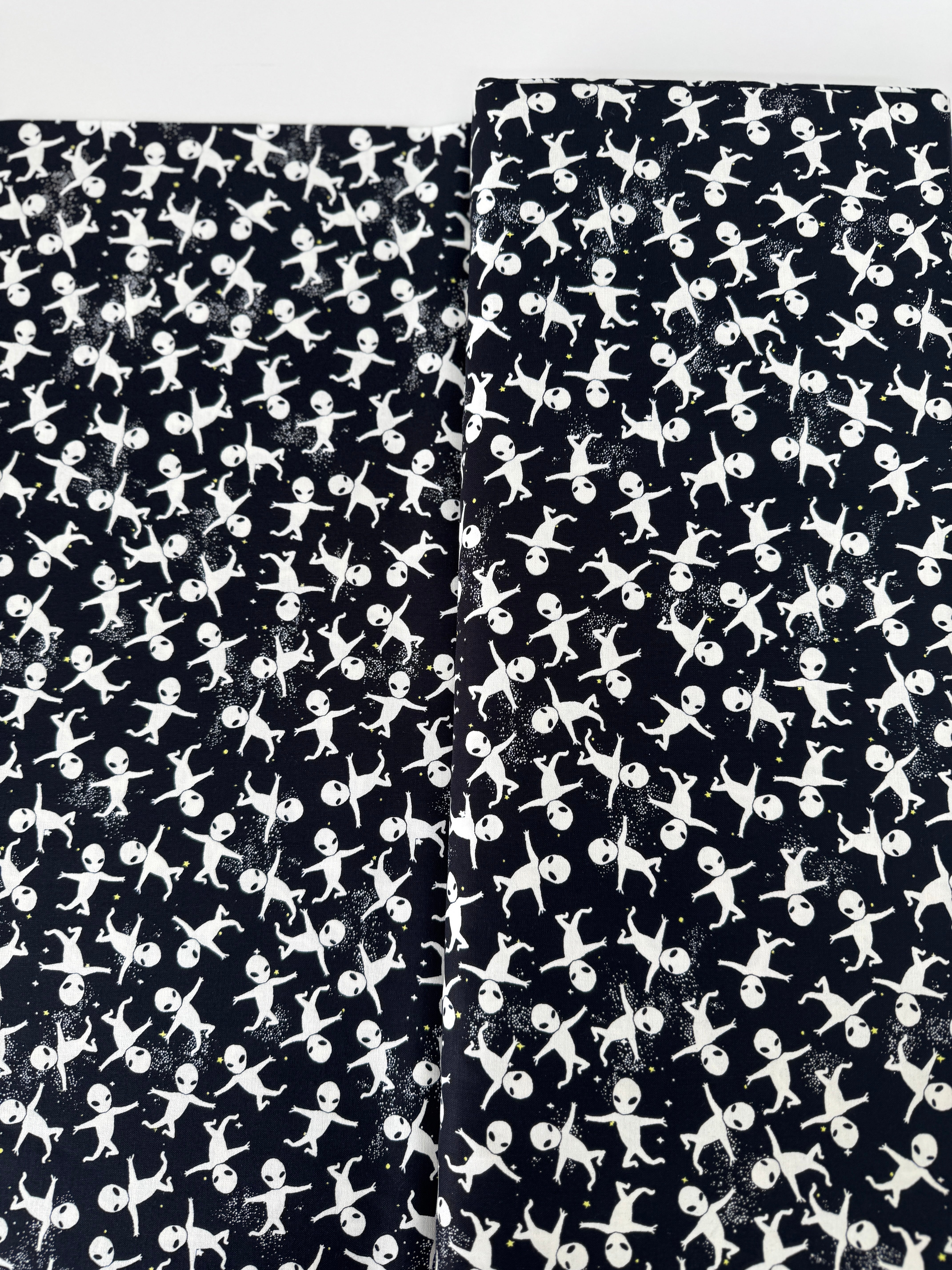 Aliens in Space glow-in-the-dark cotton fabric by Timeless Treasures – astronaut and alien motif on dark background