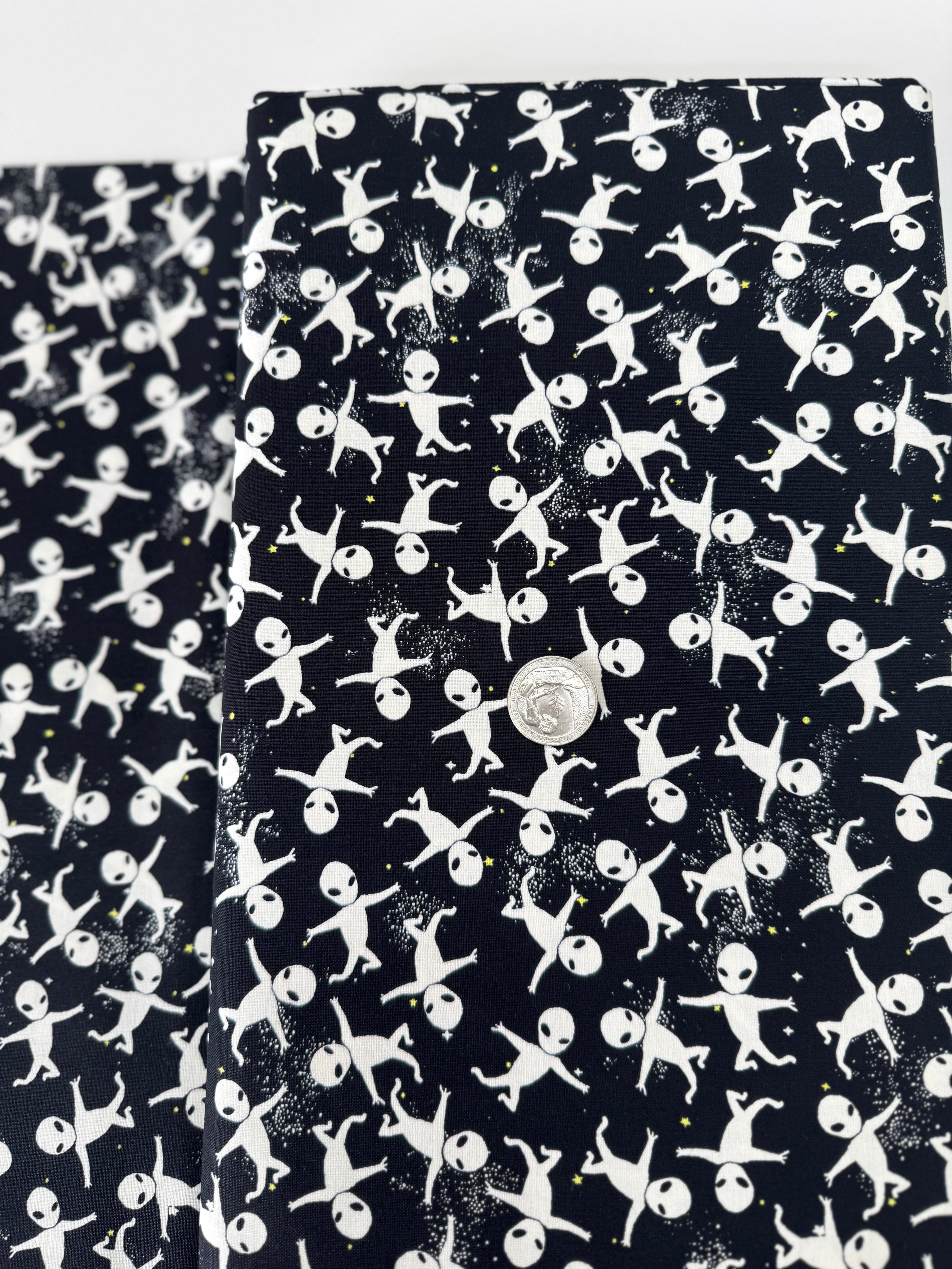 Aliens in Space glow-in-the-dark cotton fabric by Timeless Treasures – astronaut and alien motif on dark background