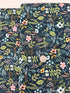 Amalfi Herb Garden Navy fabric by Rifle Paper Co. – bold floral print in pink, yellow, blue blooms with green leaves on navy background, 43″ wide