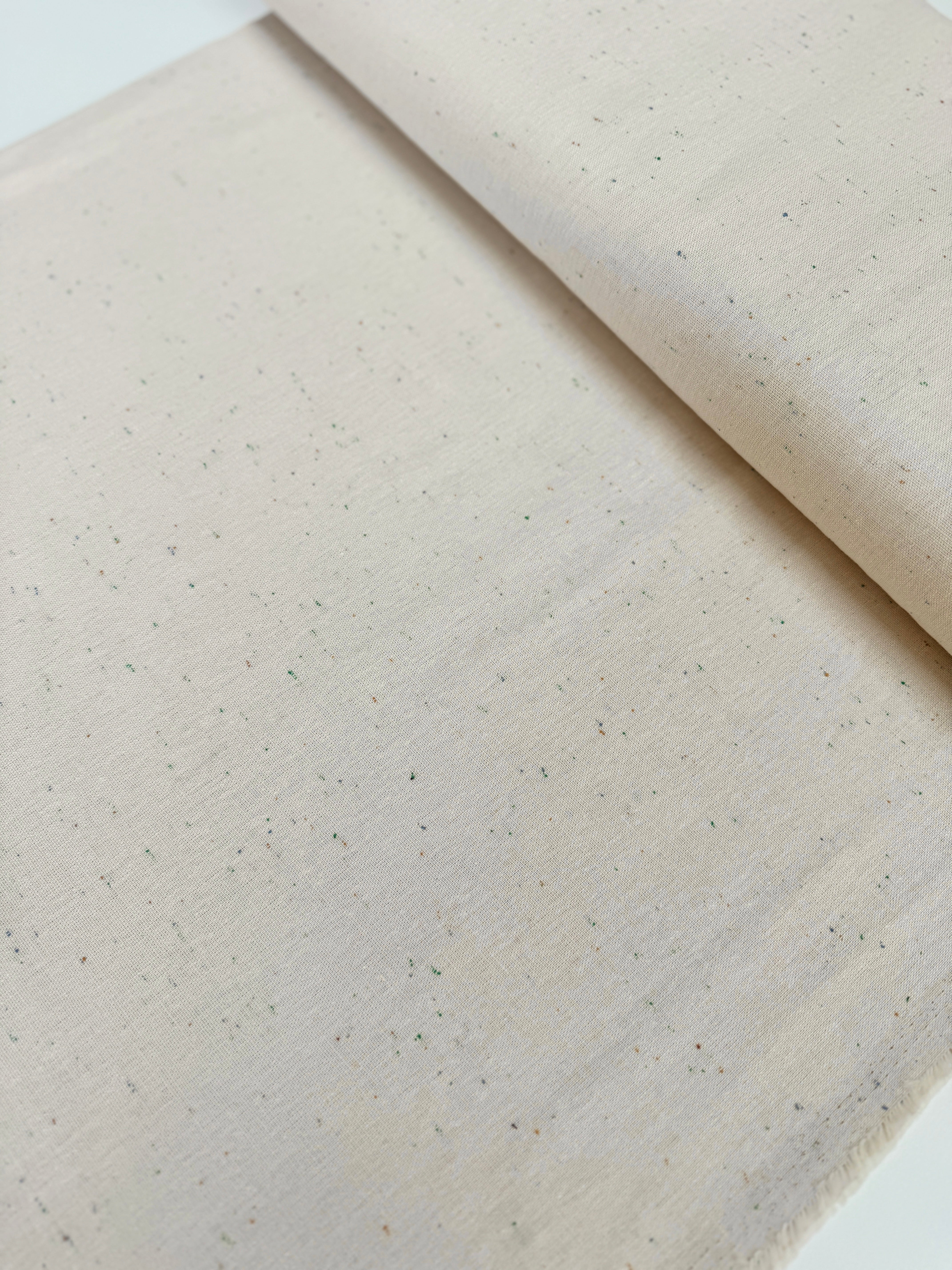 Essex Speckle Flax cotton-linen-spandex blend fabric by Robert Kaufman – speckled yarn-dye in flax color, 43"/44" wide