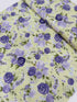 June’s Cottage Prized Roses Meadow cotton fabric by Briar Hill Designs for RJR Fabrics – rose blossoms in purple and lavender on soft background, 43"/44" wide