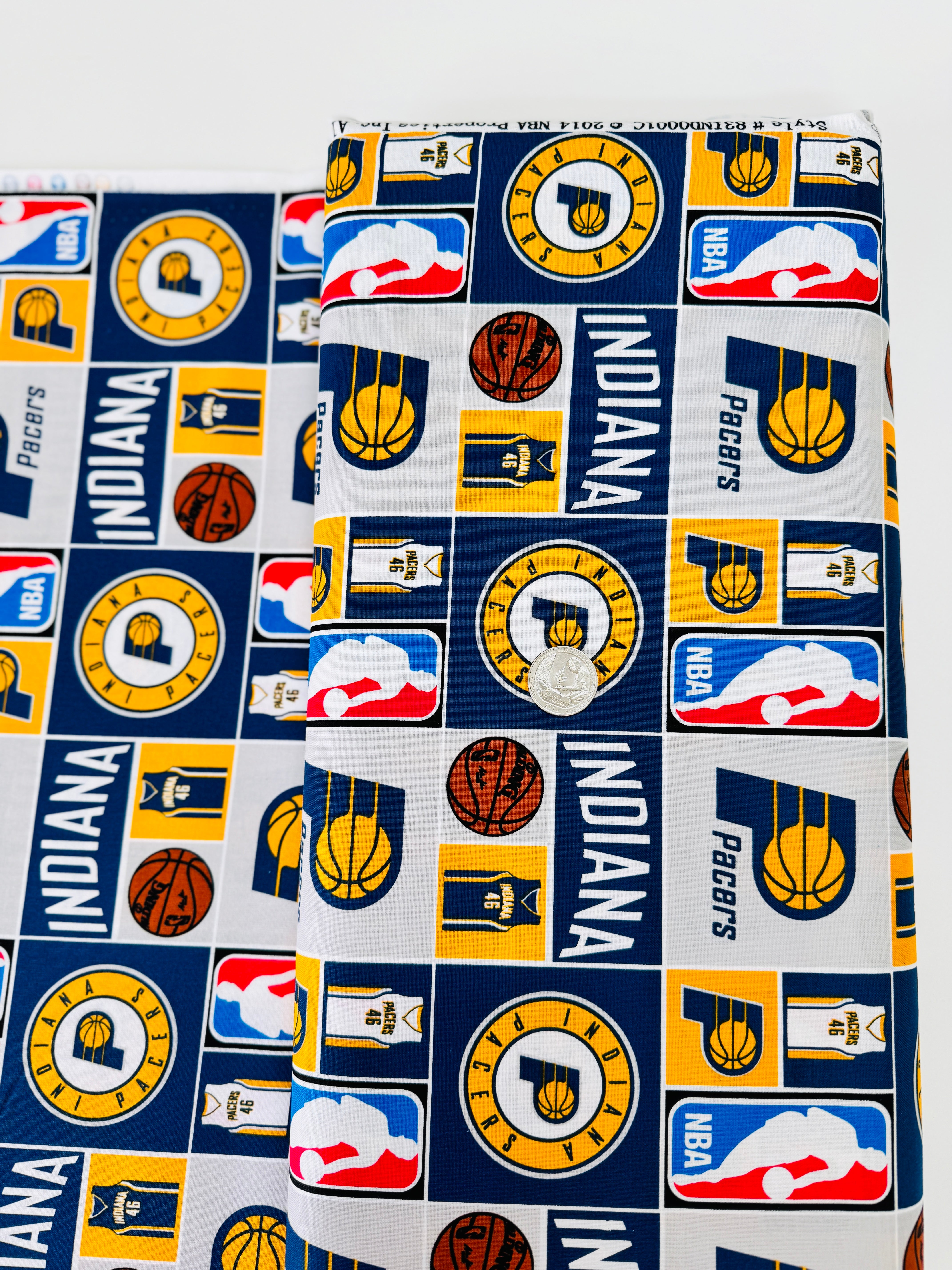 Licensed Indiana Pacers cotton fabric by Camelot Fabrics – 44" wide quilting cotton featuring Pacers logos and team colors