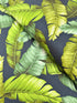 Sevenberry Island Paradise barkcloth fabric by Sevenberry for Robert Kaufman – navy background with tropical leaves; 90% cotton barkcloth