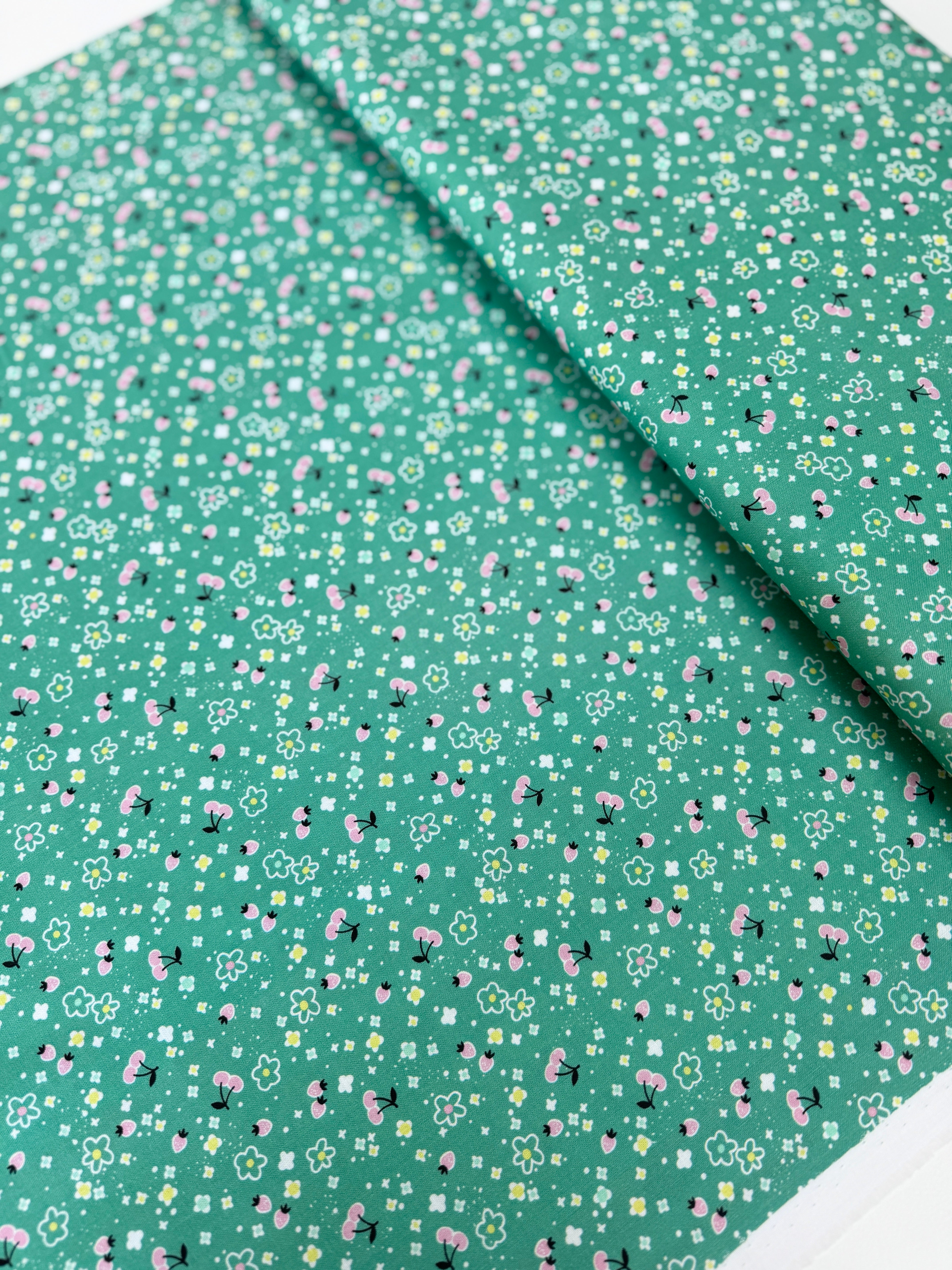 Fruitopia Berrylicious Lime fabric by Stacy Peterson – bright berry motif on lime green cotton from Blend Fabrics