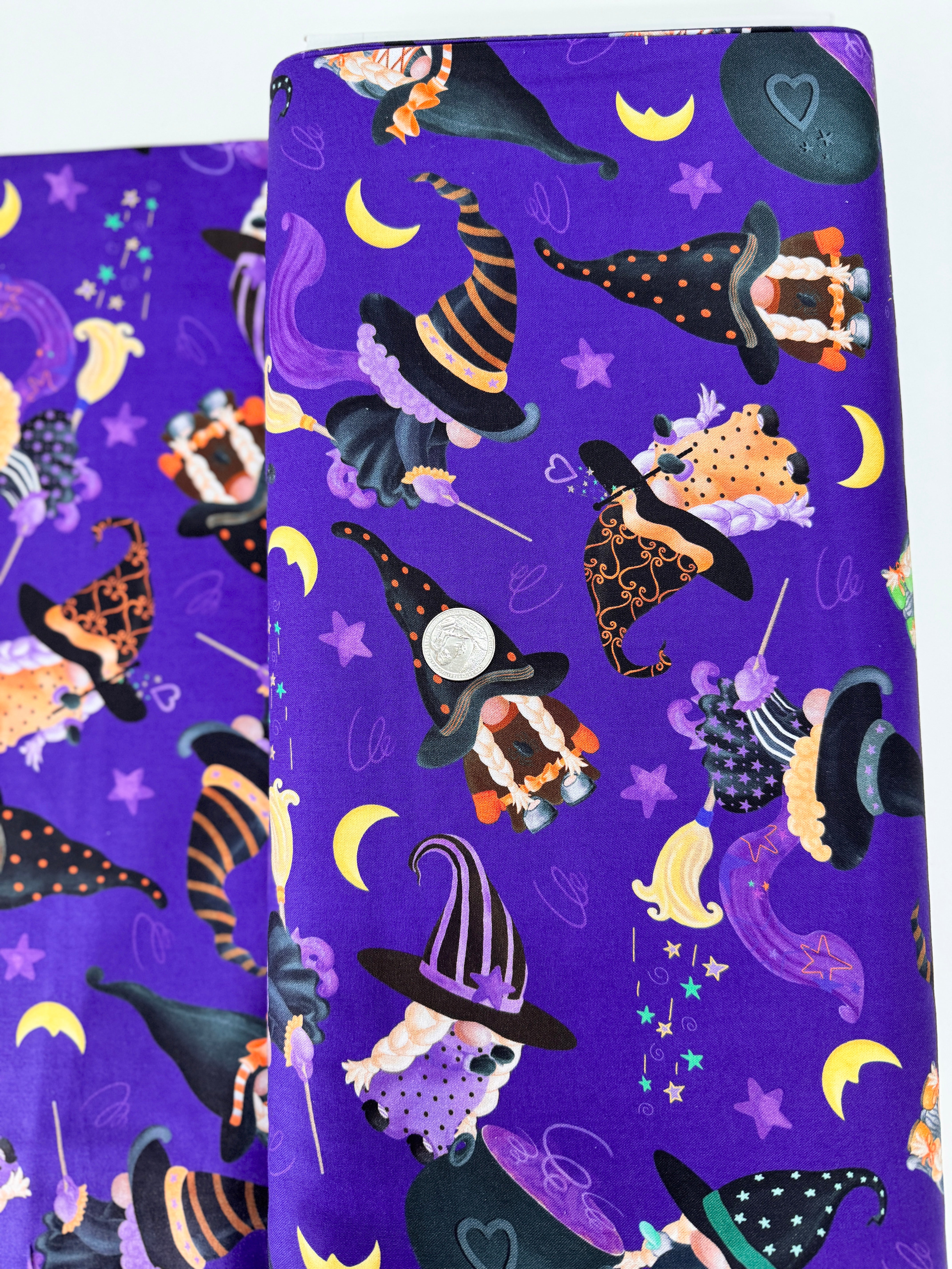 Spooktacular Gnomes fabric with purple background, Halloween gnomes, pumpkins, and stars – 12796-66 by Andi Metz for Kanvas Studio.