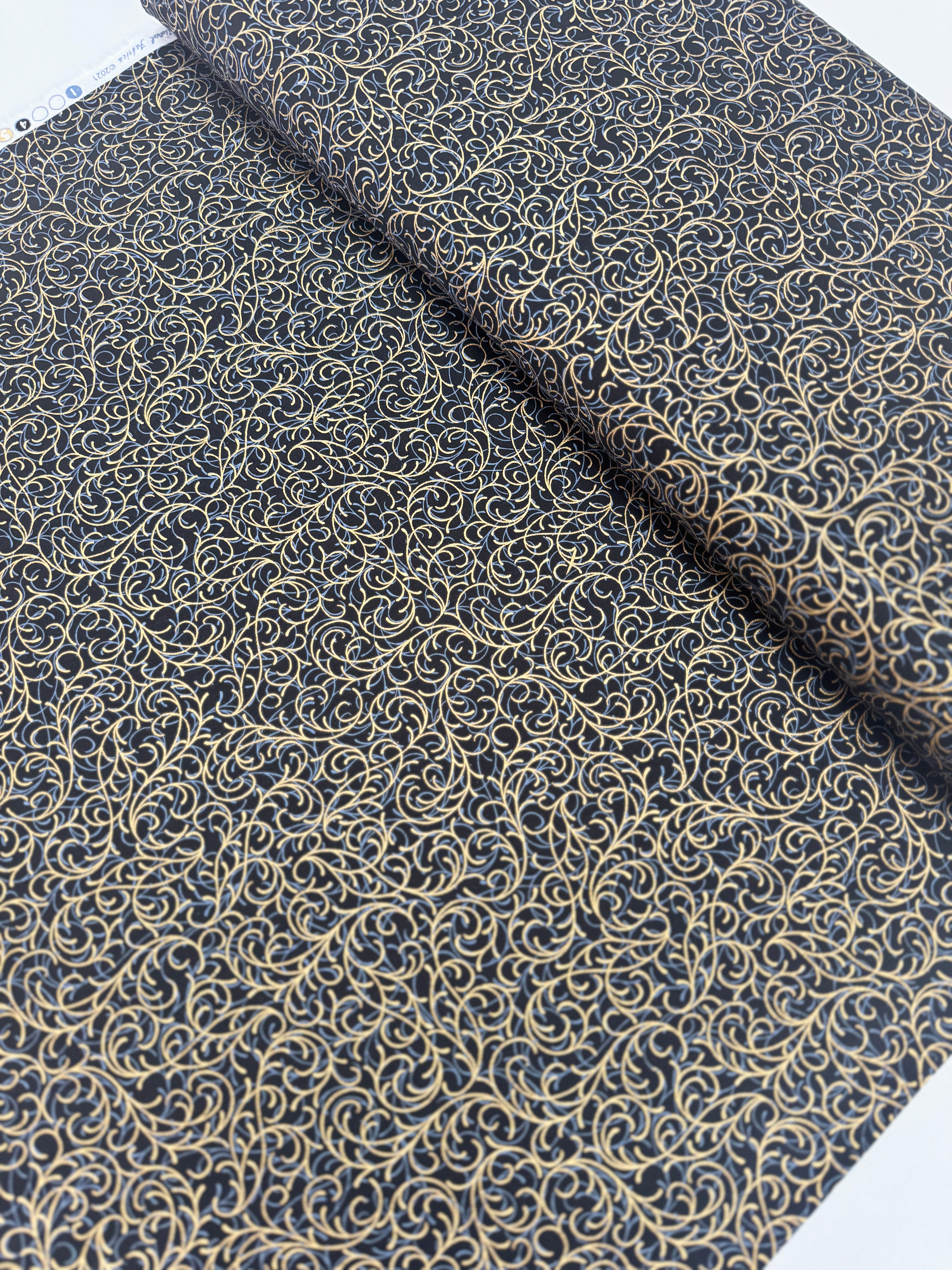 Joyful Traditions Scroll fabric by Hoffman Fabrics – black cotton with gold metallic scroll – 43"/44" wide quilting cotton