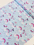Unicorn Kisses Rainbow and Clouds cotton fabric by Studio E – cheerful rainbow and fluffy cloud motif on quilting cotton, 43″ wide