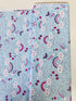 Unicorn Kisses Rainbow and Clouds cotton fabric by Studio E – cheerful rainbow and fluffy cloud motif on quilting cotton, 43″ wide