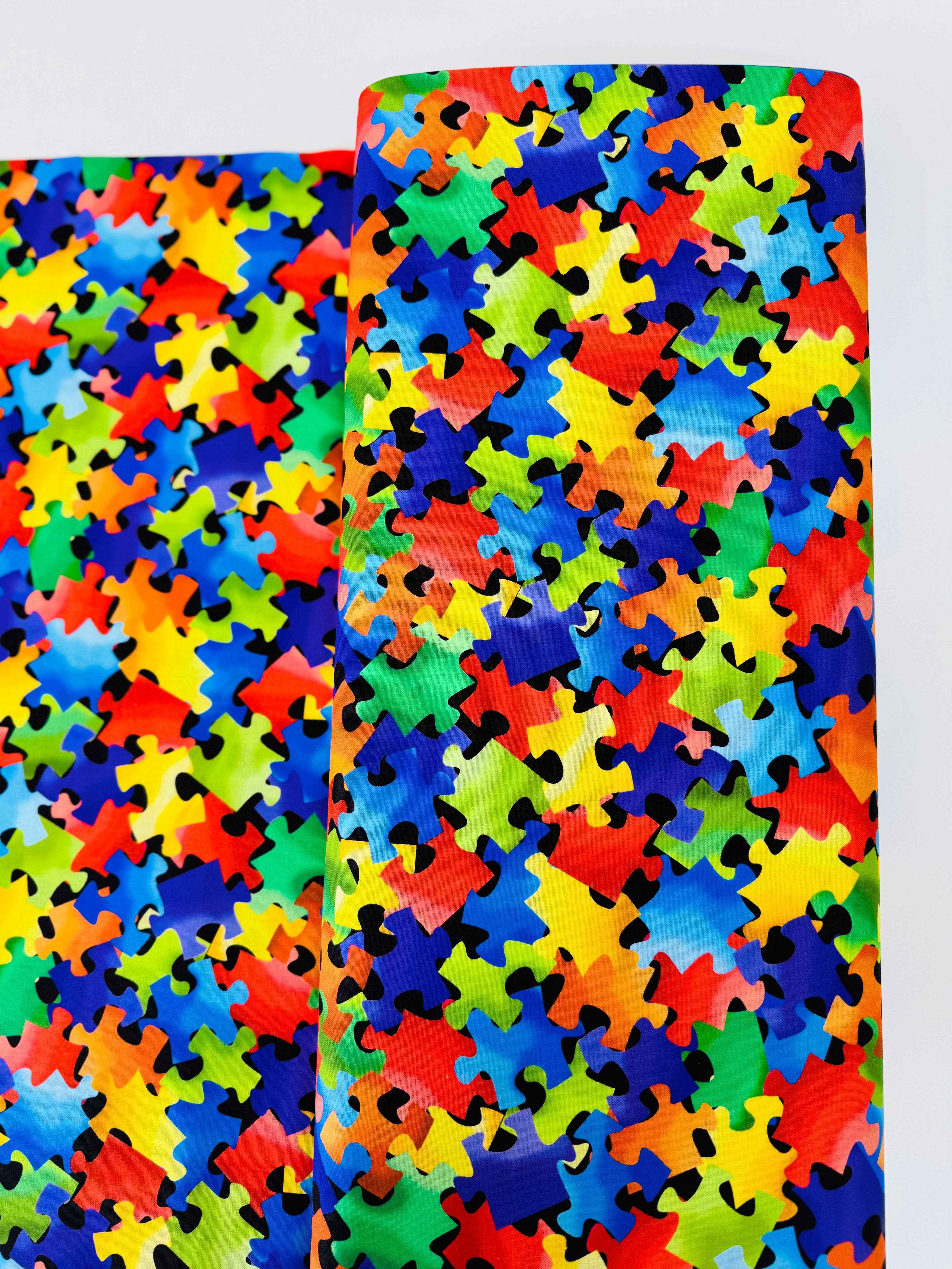 Back To School Puzzle Pieces fabric by Gail Cadden for Timeless Treasures. 100% cotton, 43″ wide fun puzzle-print perfect for kids’ quilts & crafts.