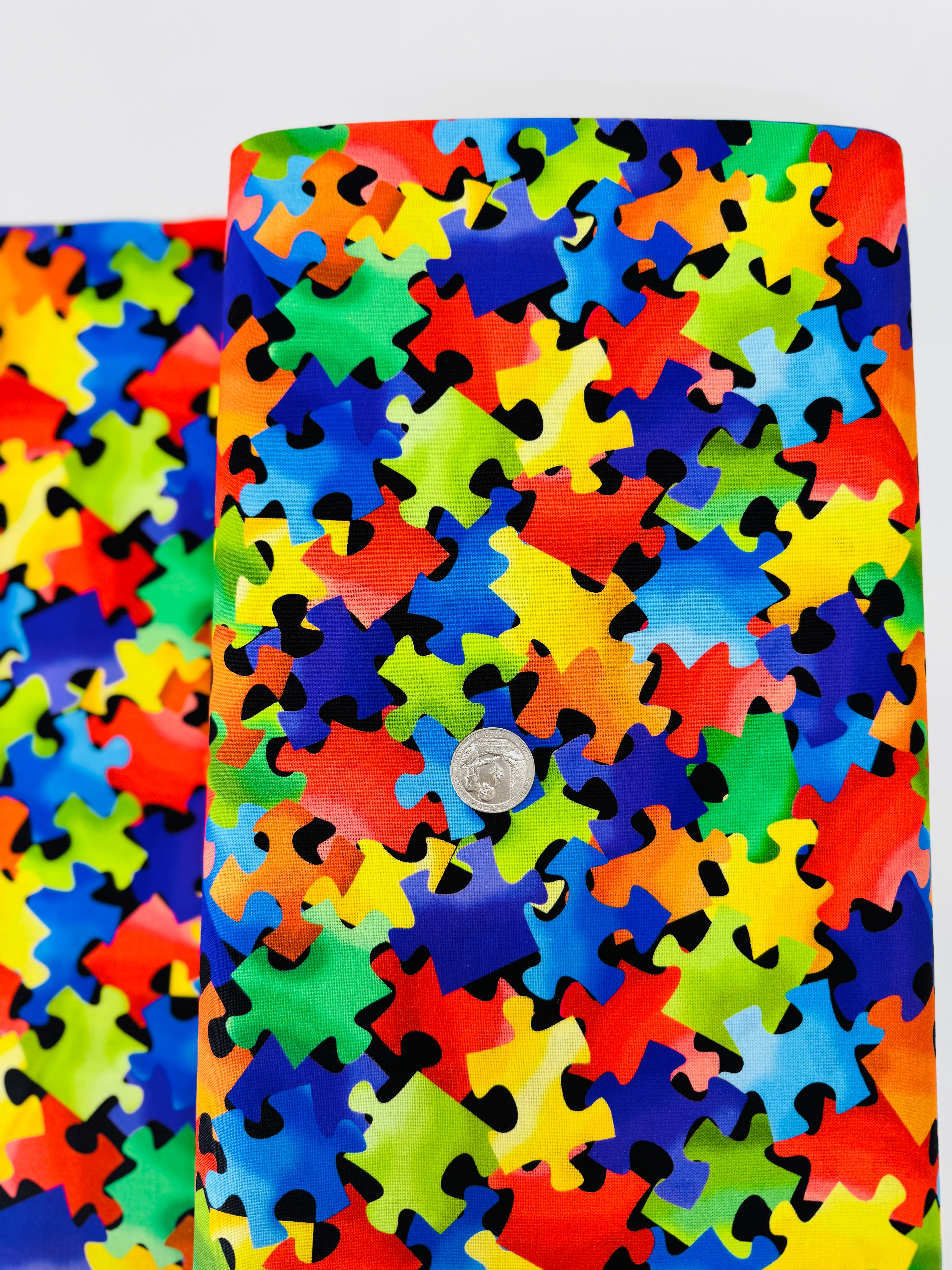 Back To School Puzzle Pieces fabric by Gail Cadden for Timeless Treasures. 100% cotton, 43″ wide fun puzzle-print perfect for kids’ quilts & crafts.