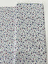 Vintage Mini Fleur multi floral cotton by Sevenberry for Robert Kaufman – small multi‑color blossoms on white background, 43/44″ wide