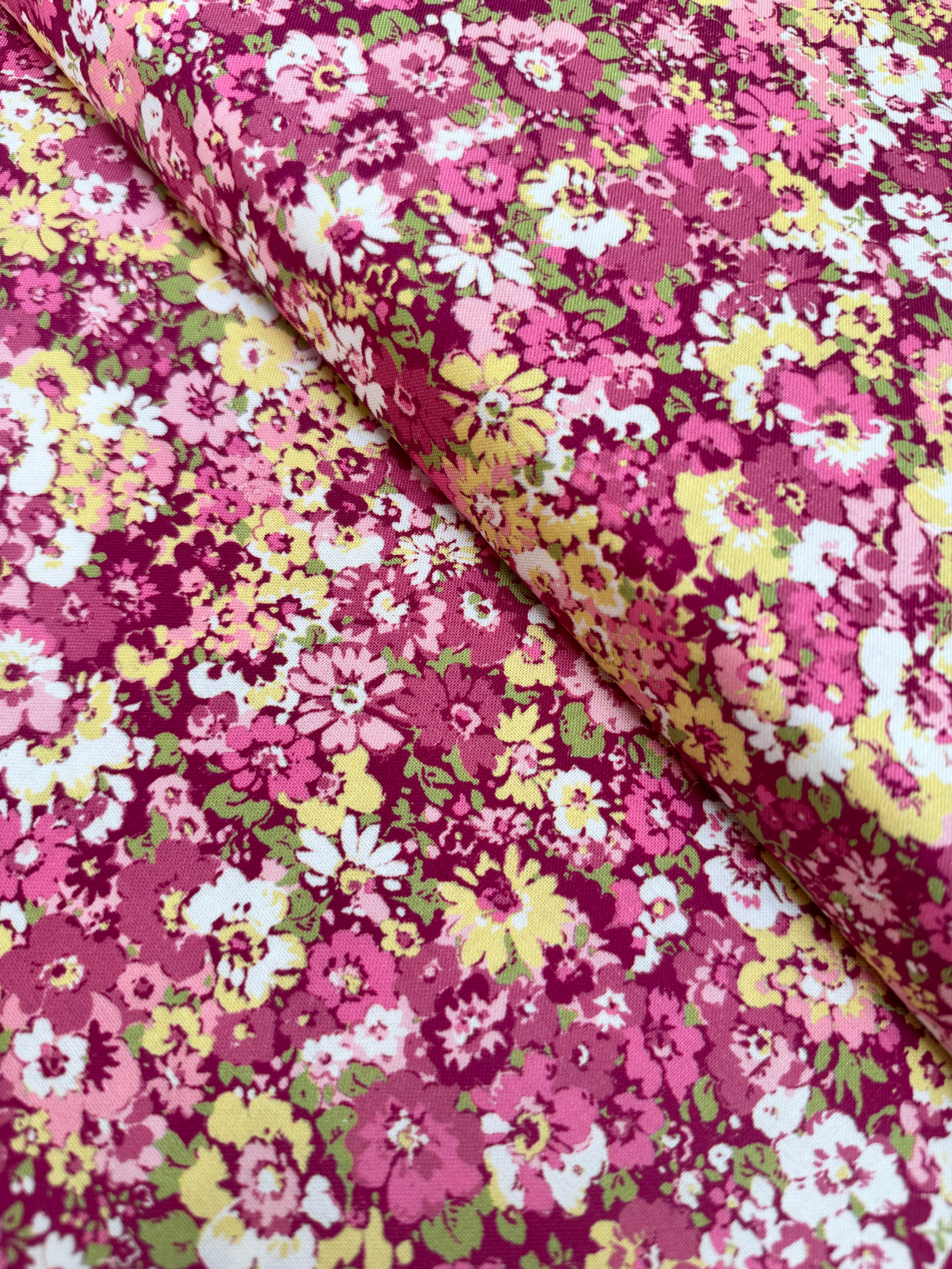 Chelsea Garden Floral Mulberry quilting cotton by Moda – vibrant jewel-tone florals on mulberry background, 43″ wide