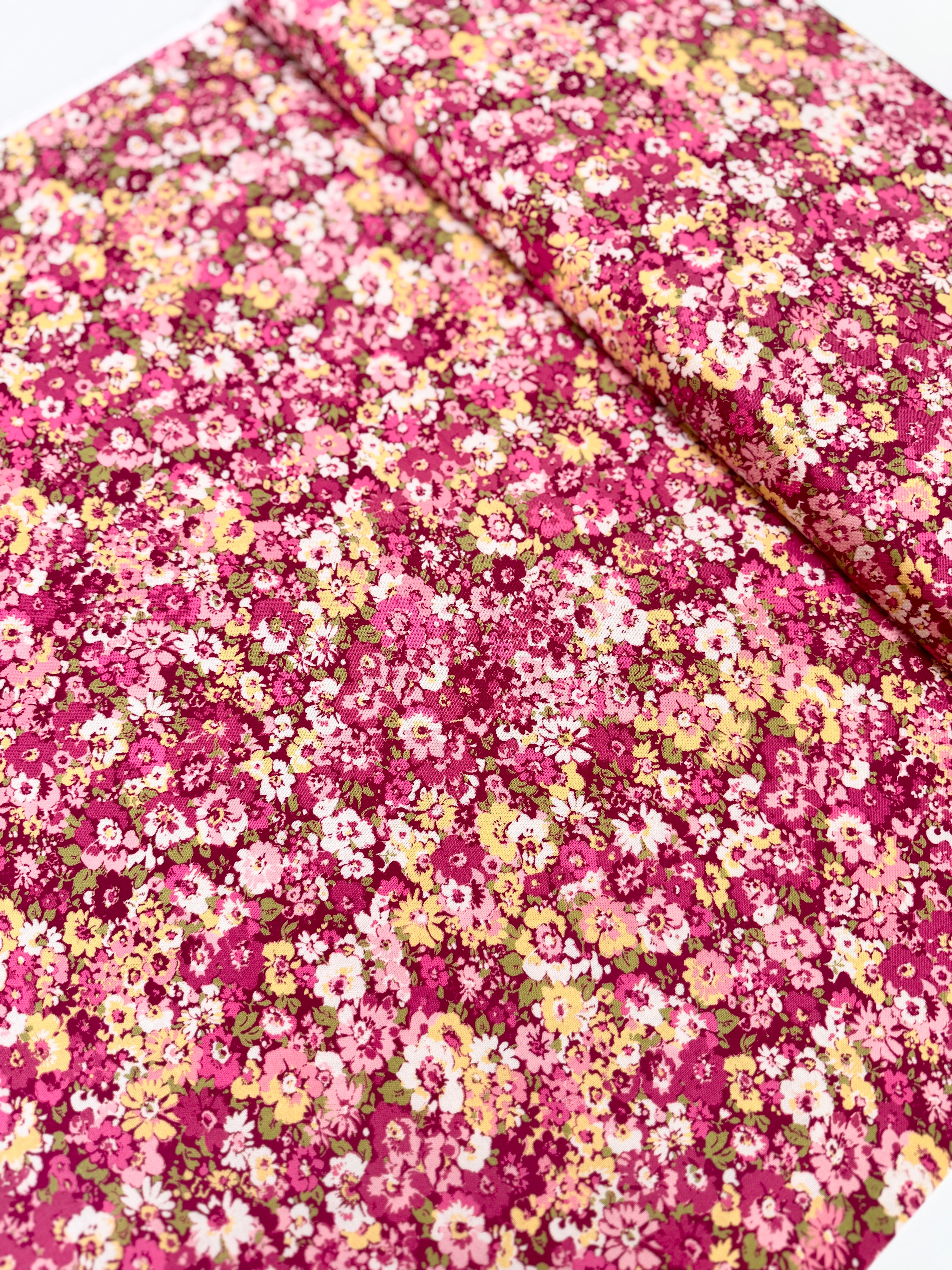 Chelsea Garden Floral Mulberry quilting cotton by Moda – vibrant jewel-tone florals on mulberry background, 43″ wide