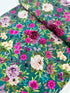 Midnight Garden Large Floral Teal cotton fabric by Danielle Leone – jewelled-tone blooms on teal background, 43″ wide