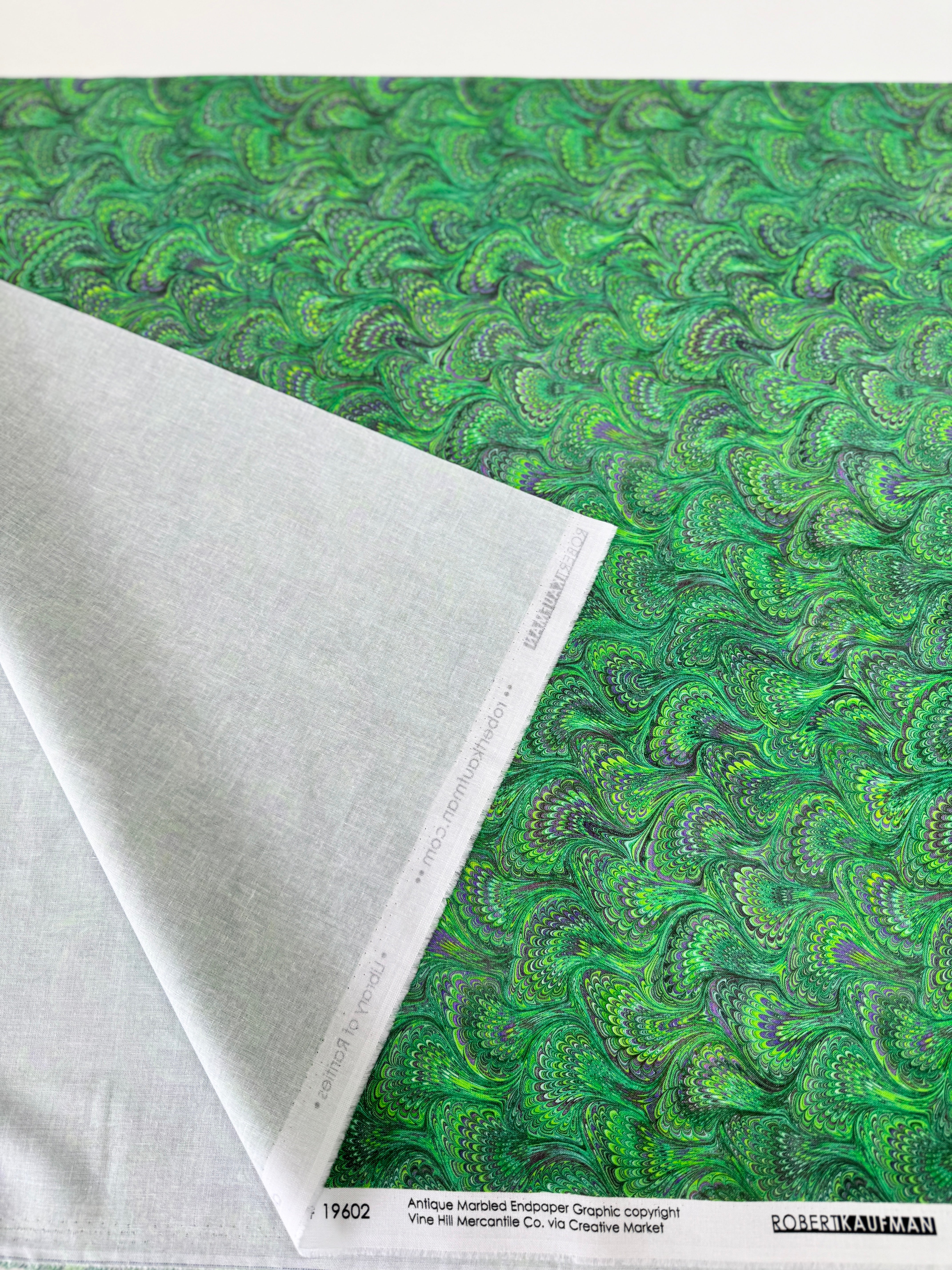 Emerald green marbled swirl print cotton quilting fabric by Aimee Stewart for Robert Kaufman