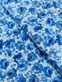 Garden Blues Sky quilting cotton by Sevenberry for Robert Kaufman – delicate blue blossoms on light sky‑blue background, 43–44″ wide