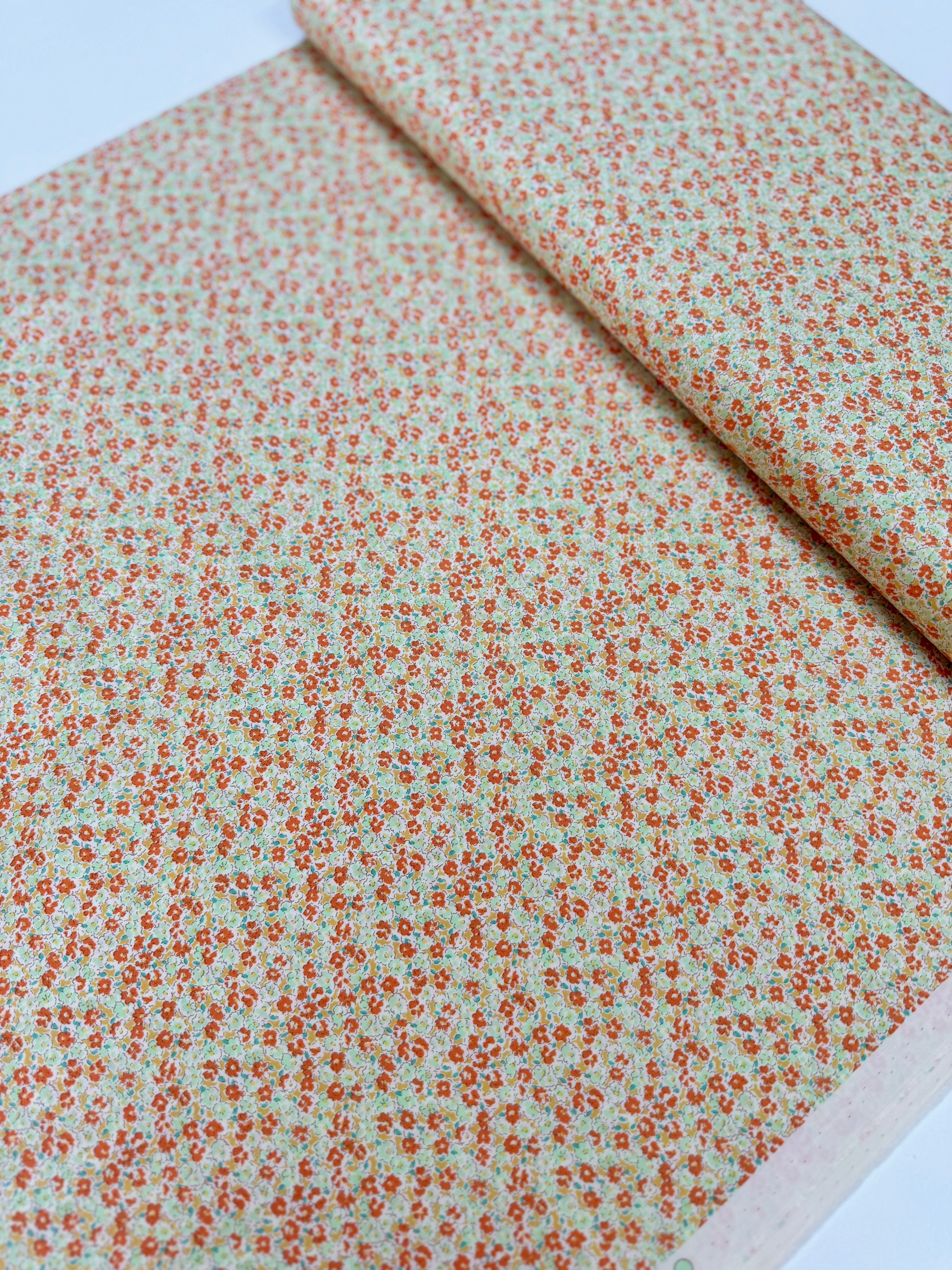 Petite Garden Sevenberry Petite Florals Orange quilting cotton – tiny orange yellow florals on white, 43″ wide