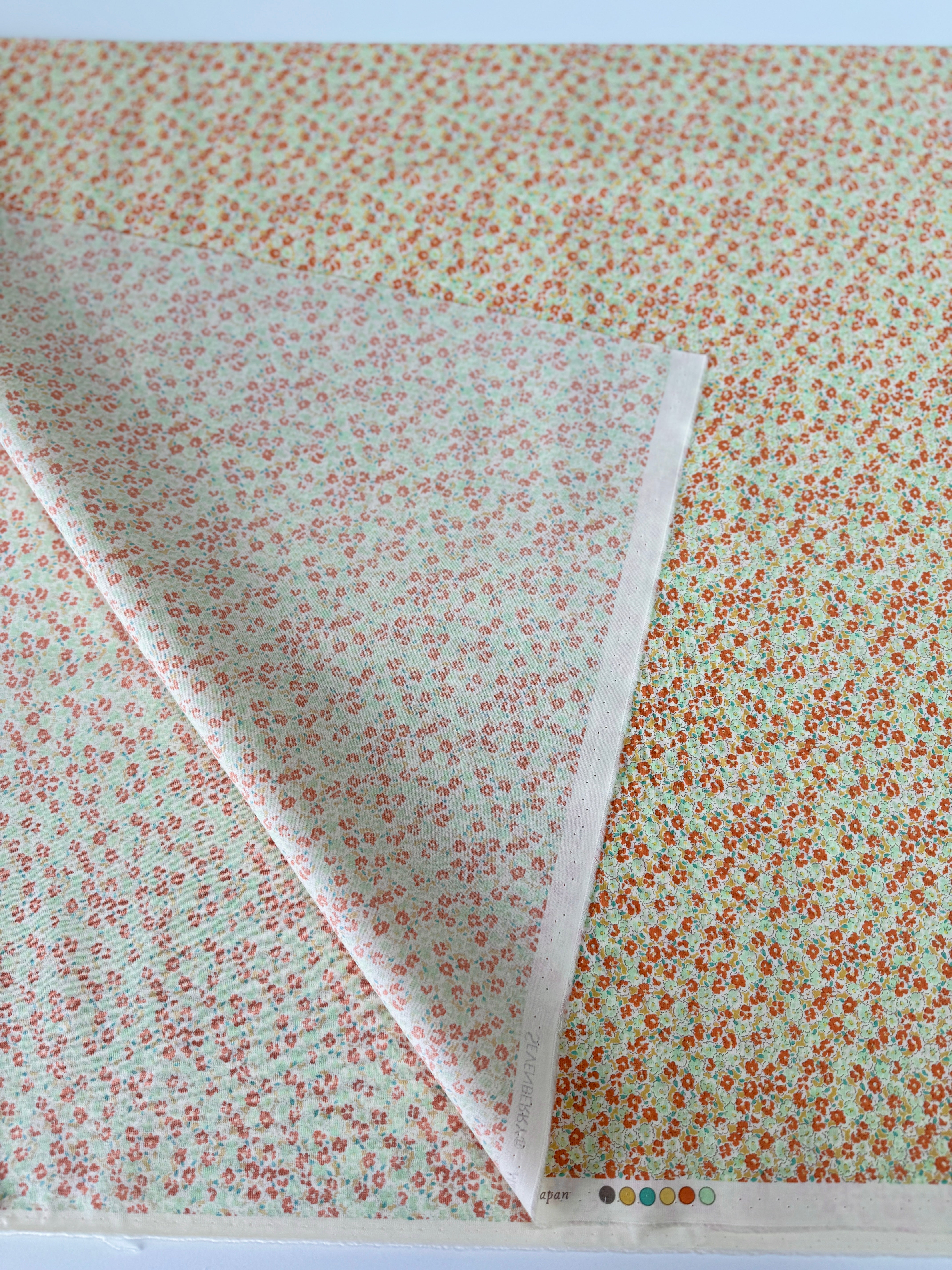 Petite Garden Sevenberry Petite Florals Orange quilting cotton – tiny orange yellow florals on white, 43″ wide