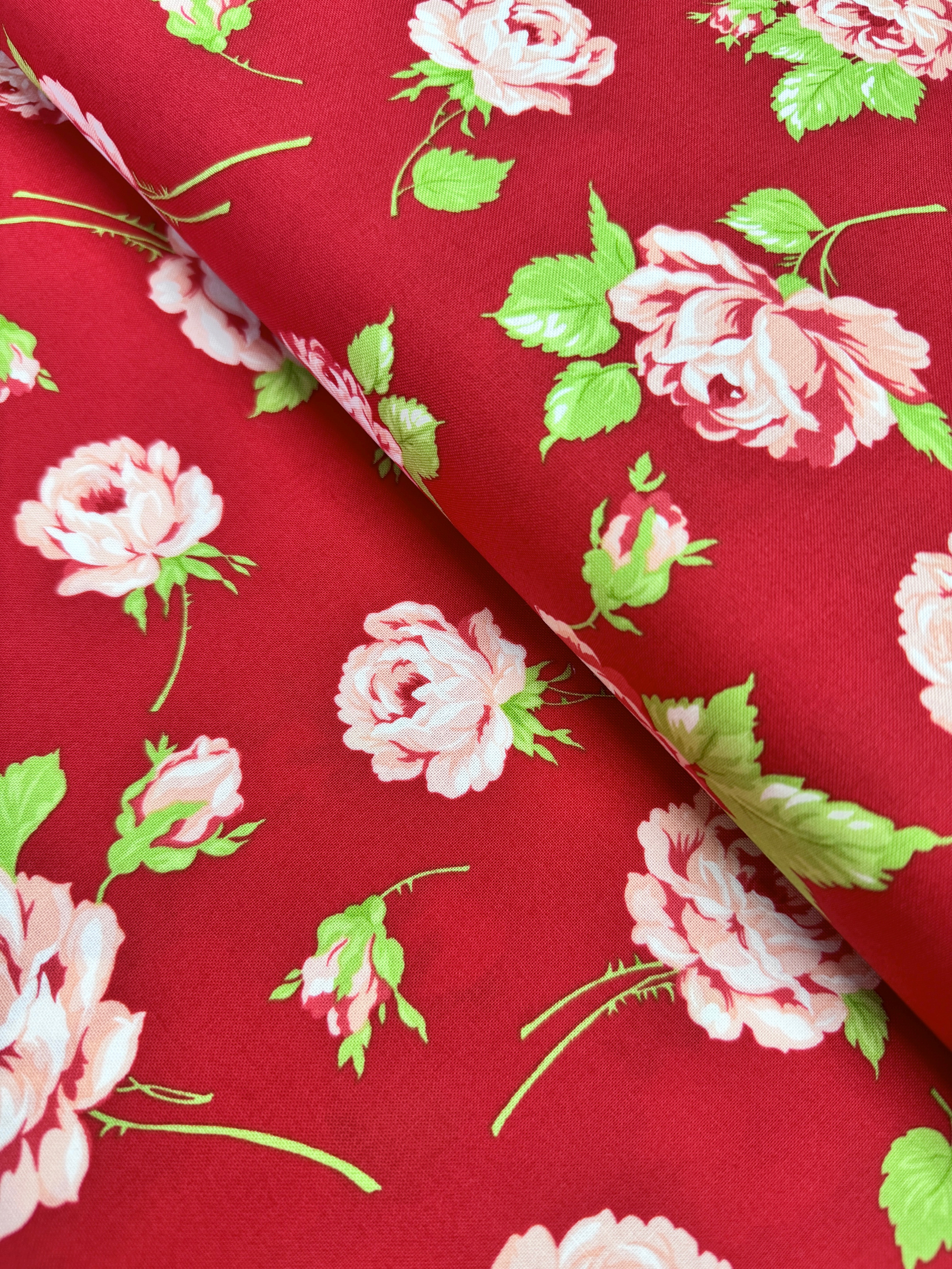 Smitten – Rosy Red floral fabric by Bonnie & Camille for Moda featuring vintage-style red florals on a soft cotton background.