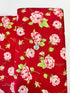 Smitten – Rosy Red floral fabric by Bonnie & Camille for Moda featuring vintage-style red florals on a soft cotton background.