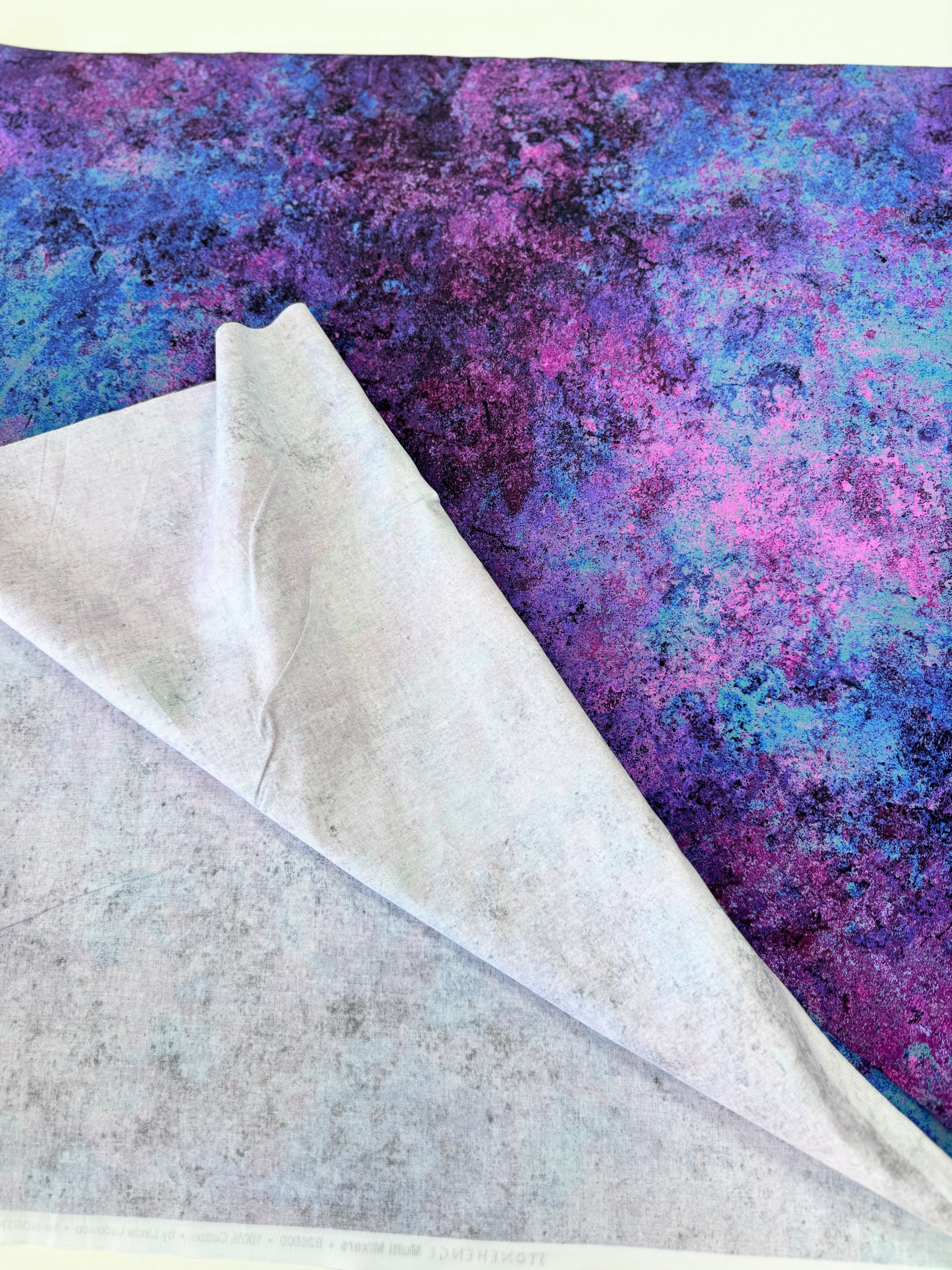 Stonehenge Multi Mixers Night Shade 108" wide backing cotton fabric by Linda Ludovico for Northcott – purple and blue textured print