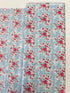Abbie Floral Aqua Fabric by Sue Daley Designs for Riley Blake – Aqua background with red and white floral print