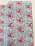 Abbie Floral Aqua Fabric by Sue Daley Designs for Riley Blake – Aqua background with red and white floral print