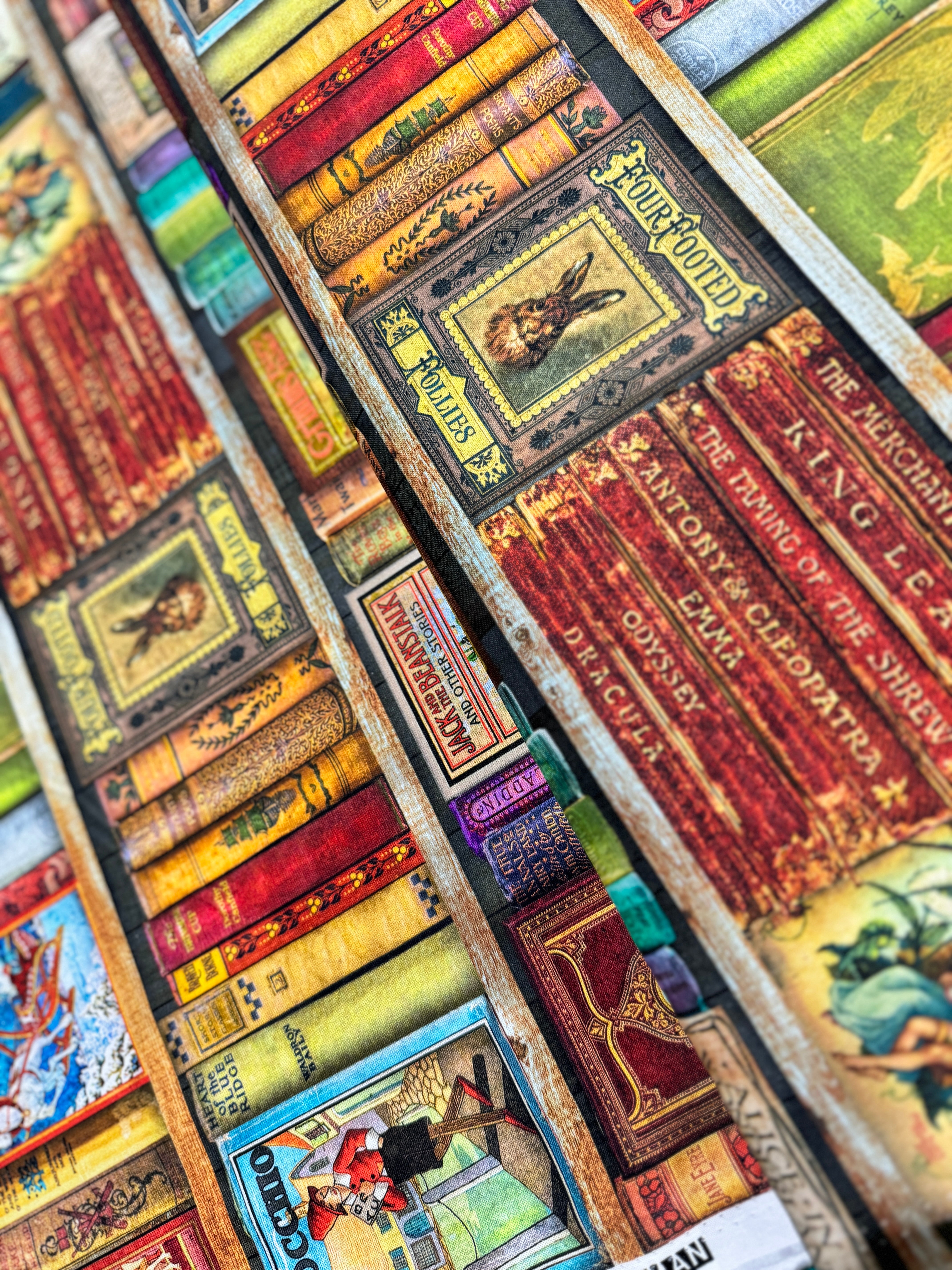 Library of Rarities Books Antique fabric by Aimee Stewart for Robert Kaufman featuring vintage bookshelves filled with beautifully illustrated classic storybooks and antique book spines, perfect for quilts, book sleeves, library décor, and literary sewing projects.