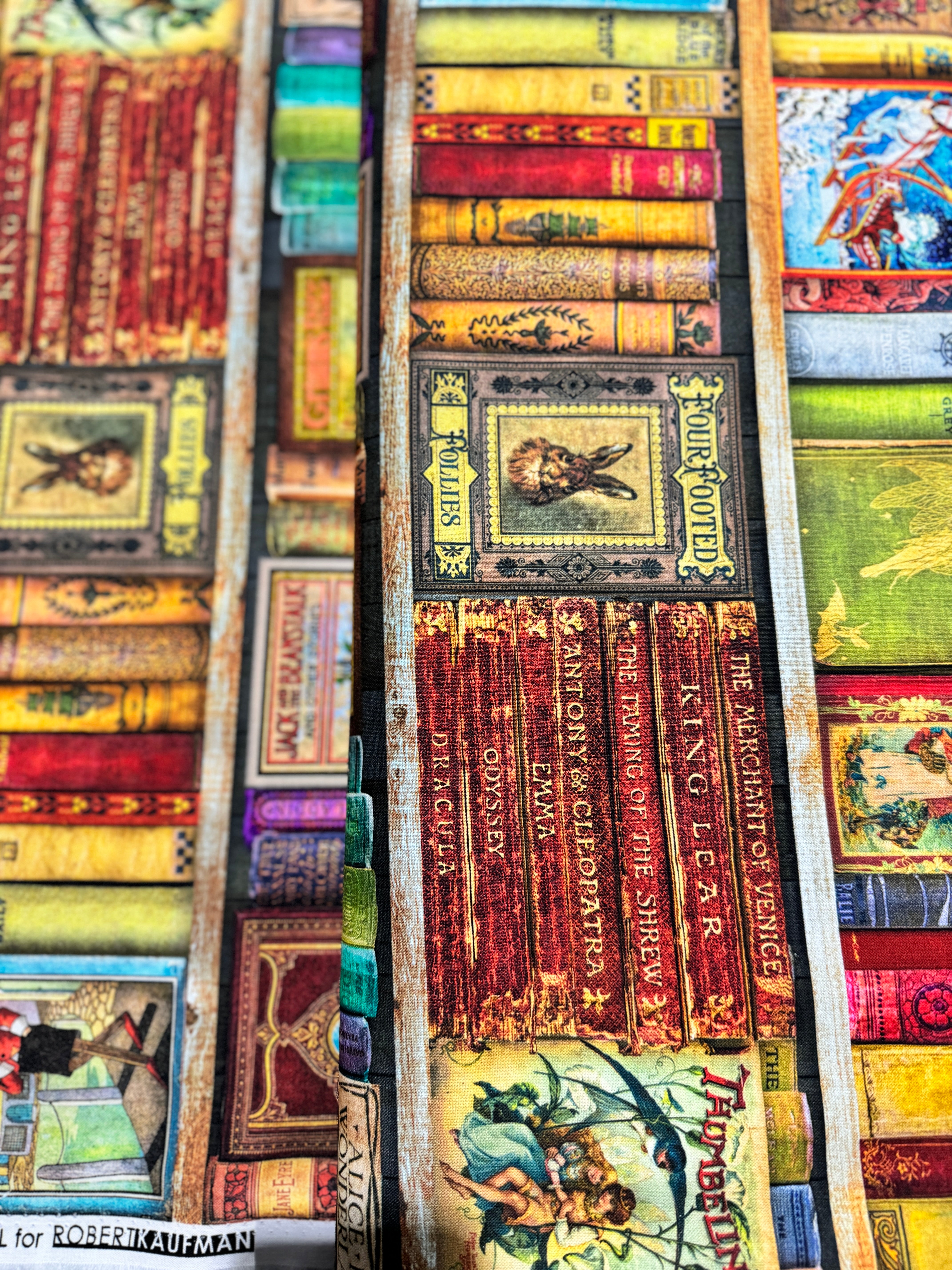 Library of Rarities Books Antique fabric by Aimee Stewart for Robert Kaufman featuring vintage bookshelves filled with beautifully illustrated classic storybooks and antique book spines, perfect for quilts, book sleeves, library décor, and literary sewing projects.