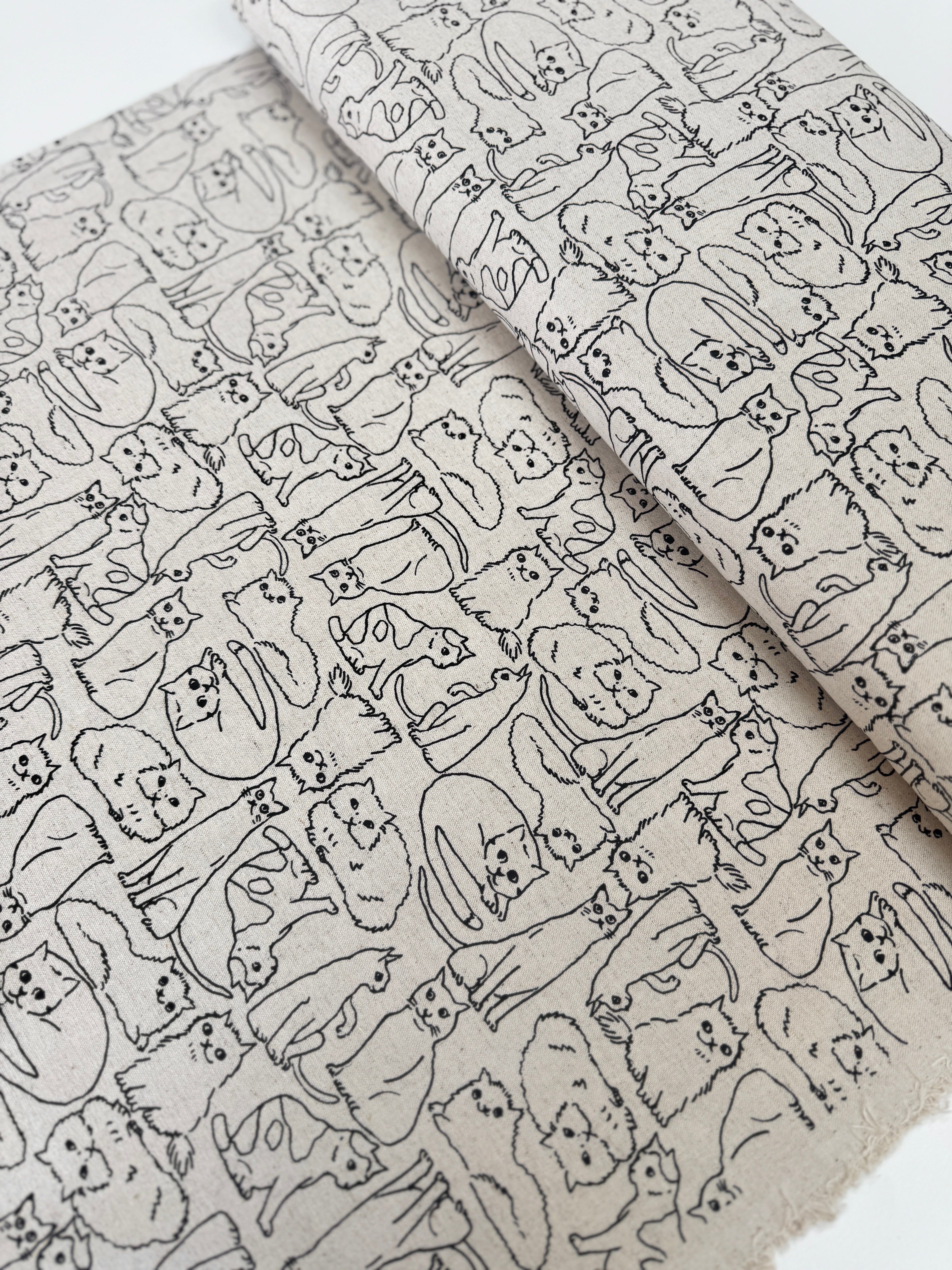 Cotton Flax Cats on Natural Fabric by Robert Kaufman – neutral background with black cat print