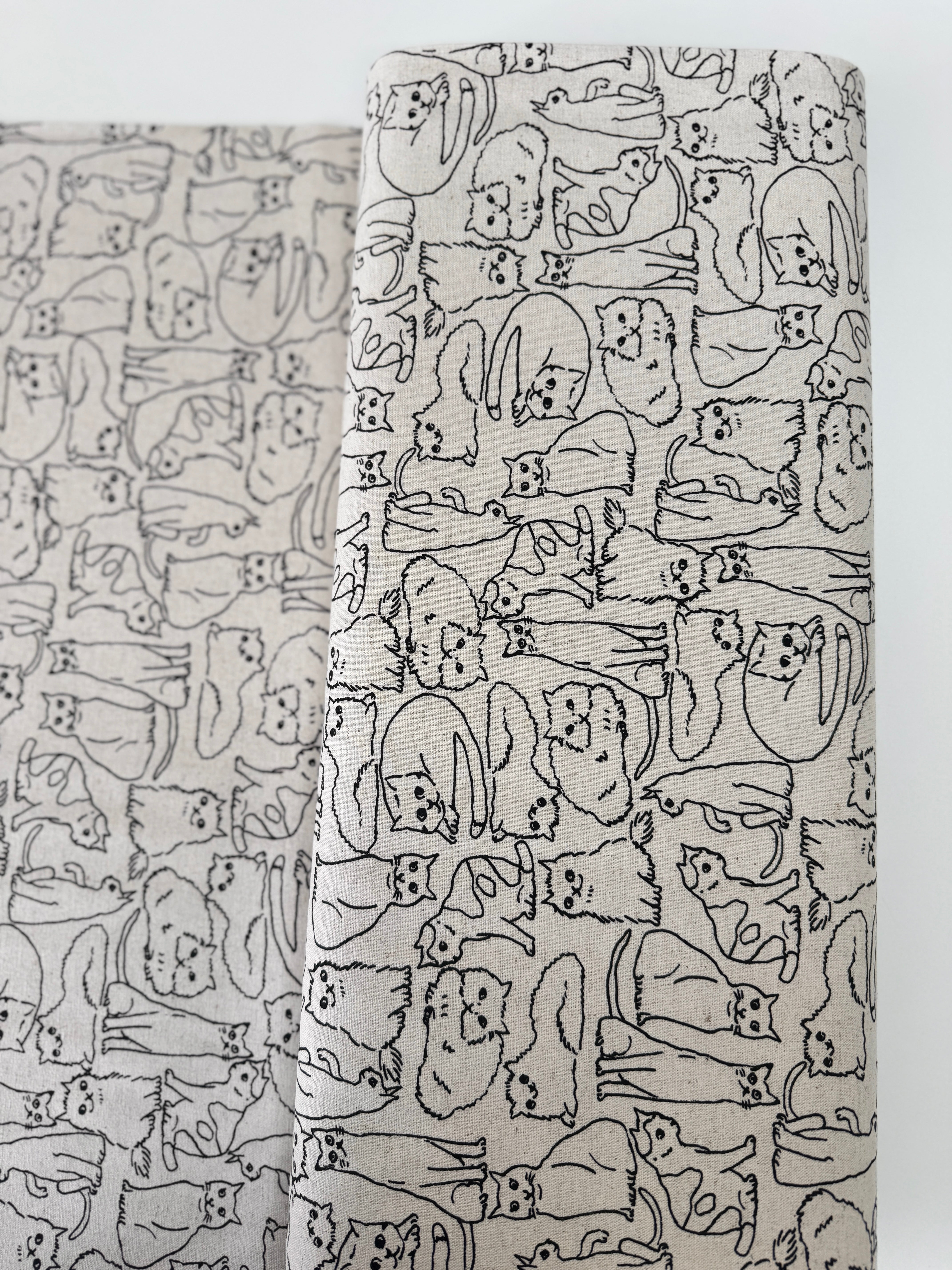 Cotton Flax Cats on Natural Fabric by Robert Kaufman – neutral background with black cat print