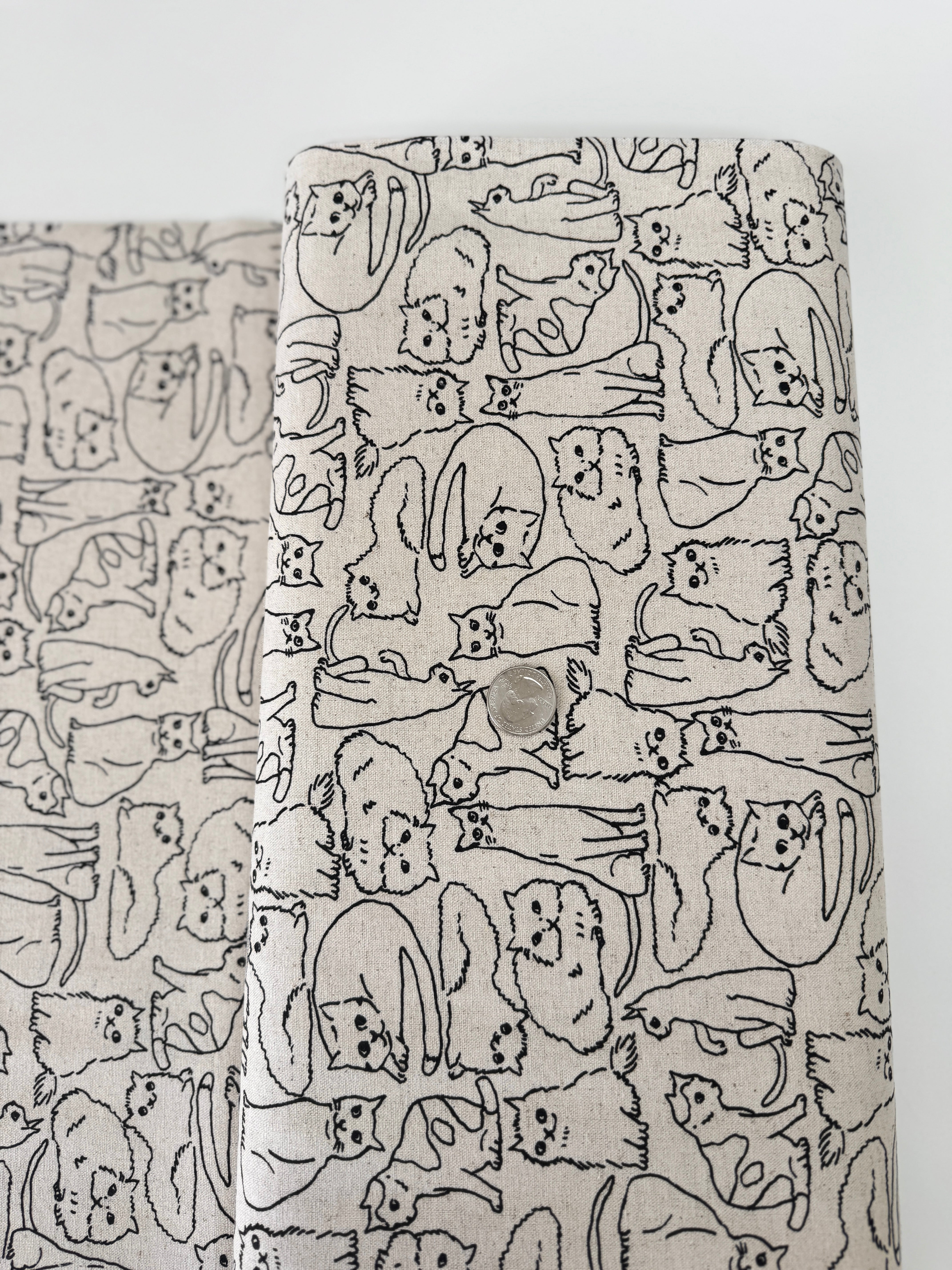 Cotton Flax Cats on Natural Fabric by Robert Kaufman – neutral background with black cat print