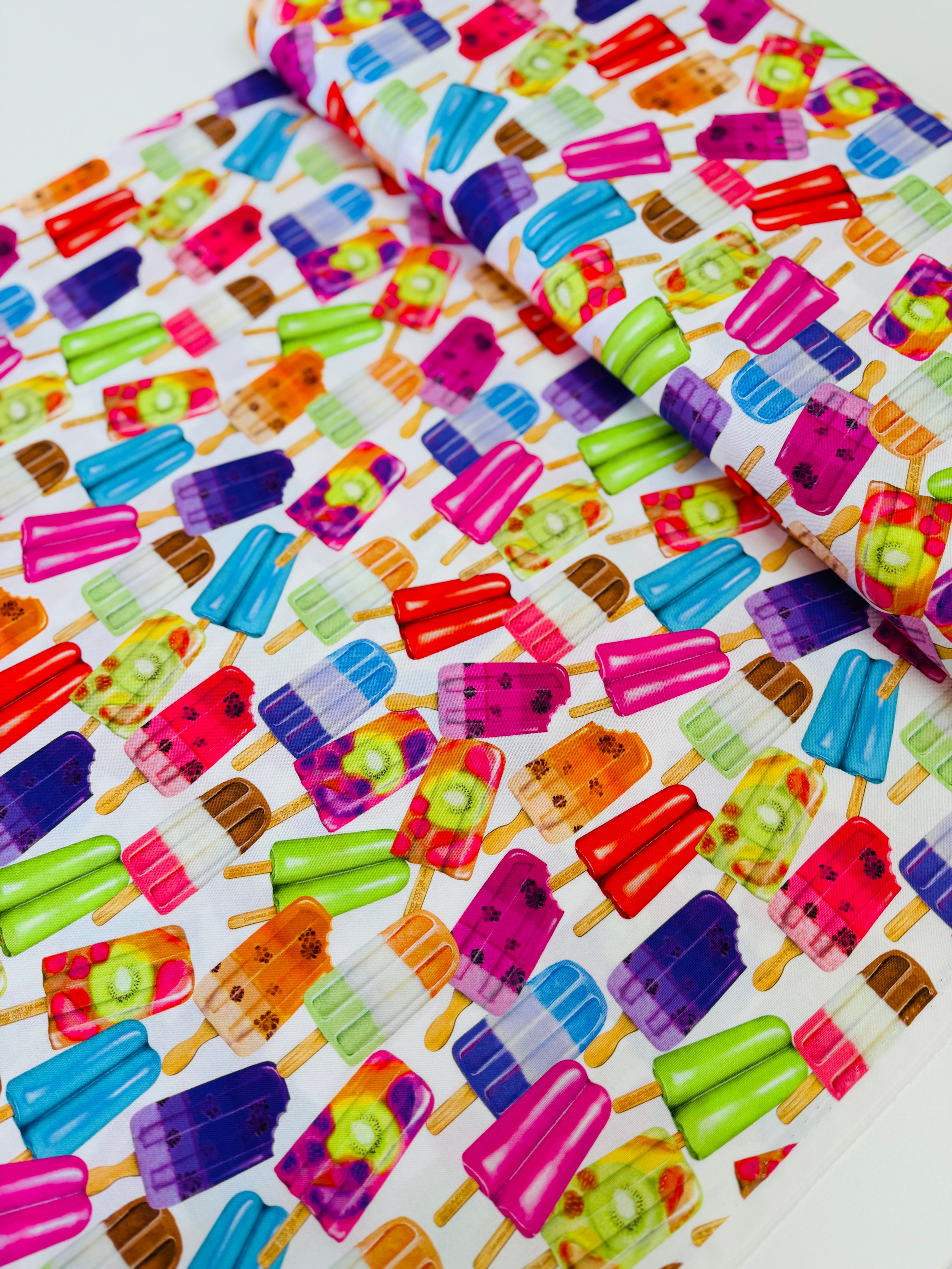 Sweet Tooth Popsicles fabric by Mary Lake Thompson for Robert Kaufman Fabrics – colorful popsicles on white background, 100% cotton quilting fabric.