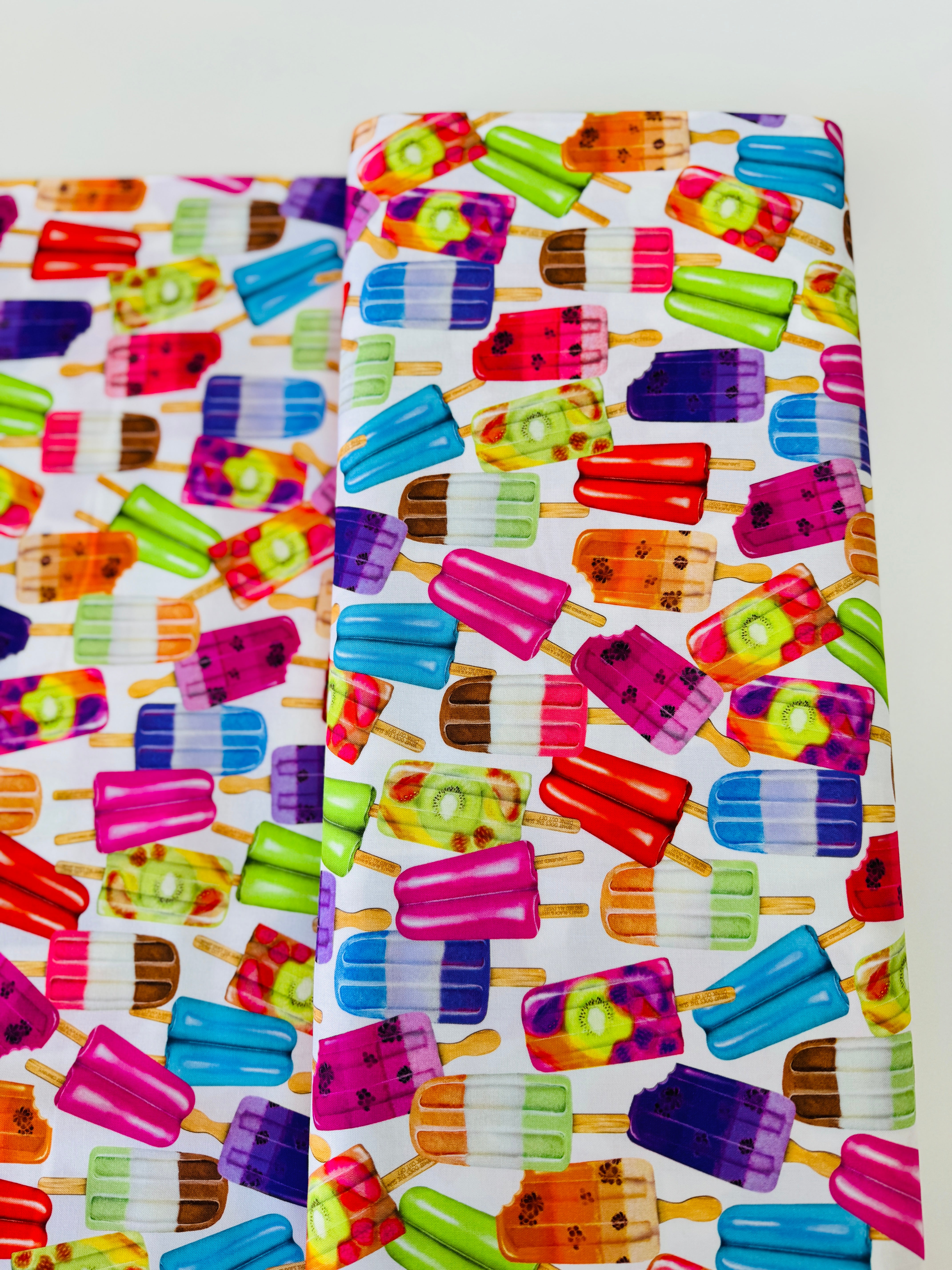 Sweet Tooth Popsicles fabric by Mary Lake Thompson for Robert Kaufman Fabrics – colorful popsicles on white background, 100% cotton quilting fabric.