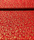 Traditional Trimmings - Gold Swirls Snowflakes on Red - Remnant