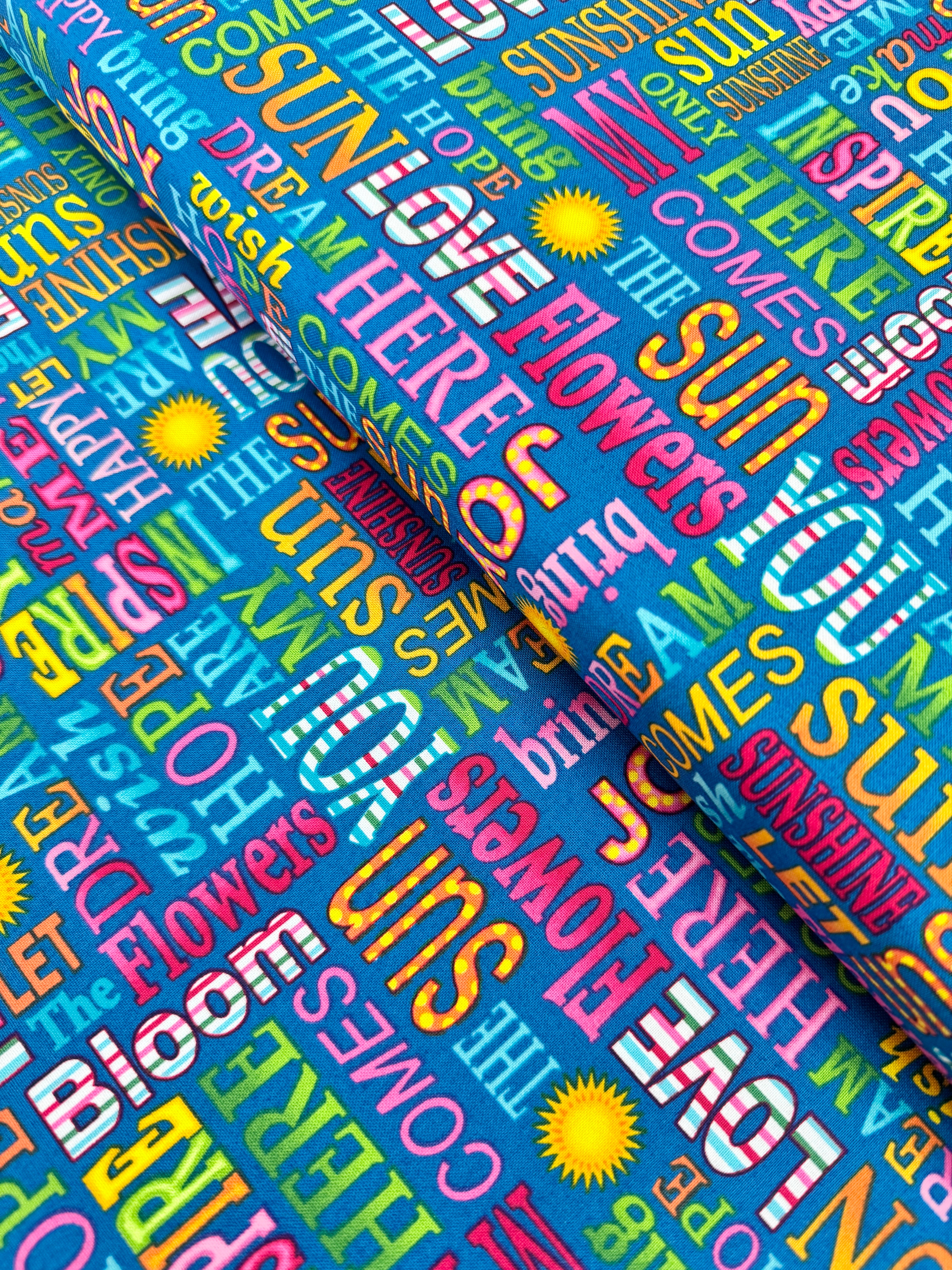 Sunshine Kisses – Words Fabric by Studio E Fabrics – uplifting typography print on premium quilting cotton